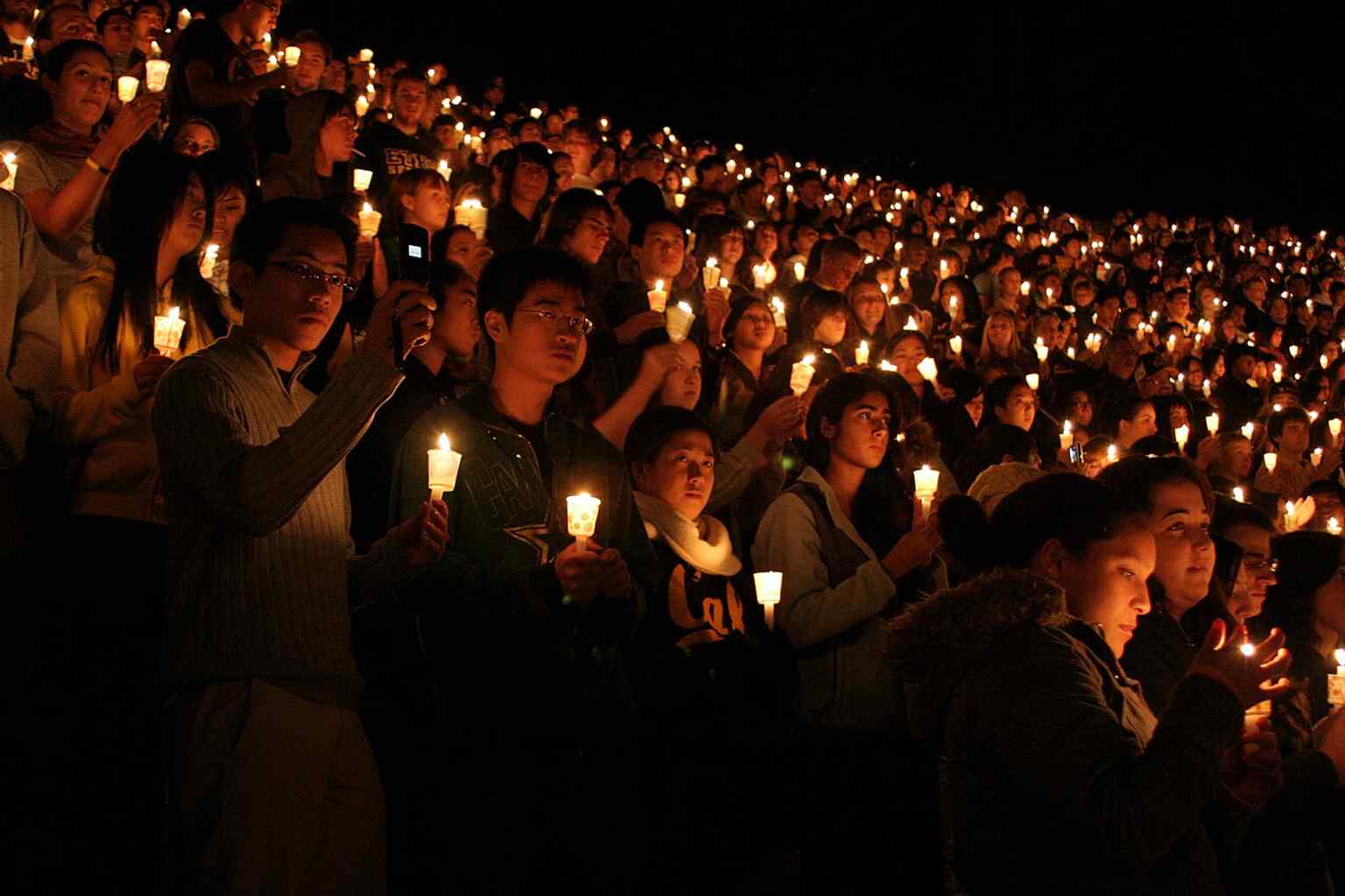 Students and alumni gathering for the Big Game bonfire recall the Greek Theatre’s role in major campus traditions and rally events.