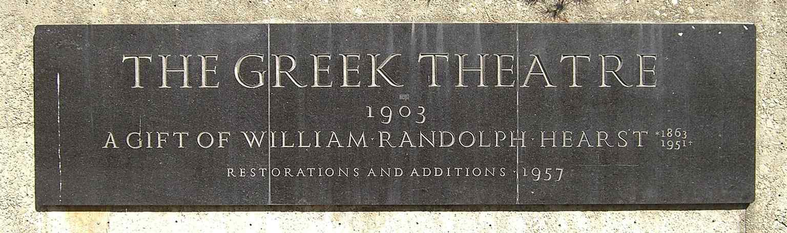 The entrance sign identifies the landmark by its familiar local name, the Greek Theatre, long associated with UC Berkeley events and concerts.