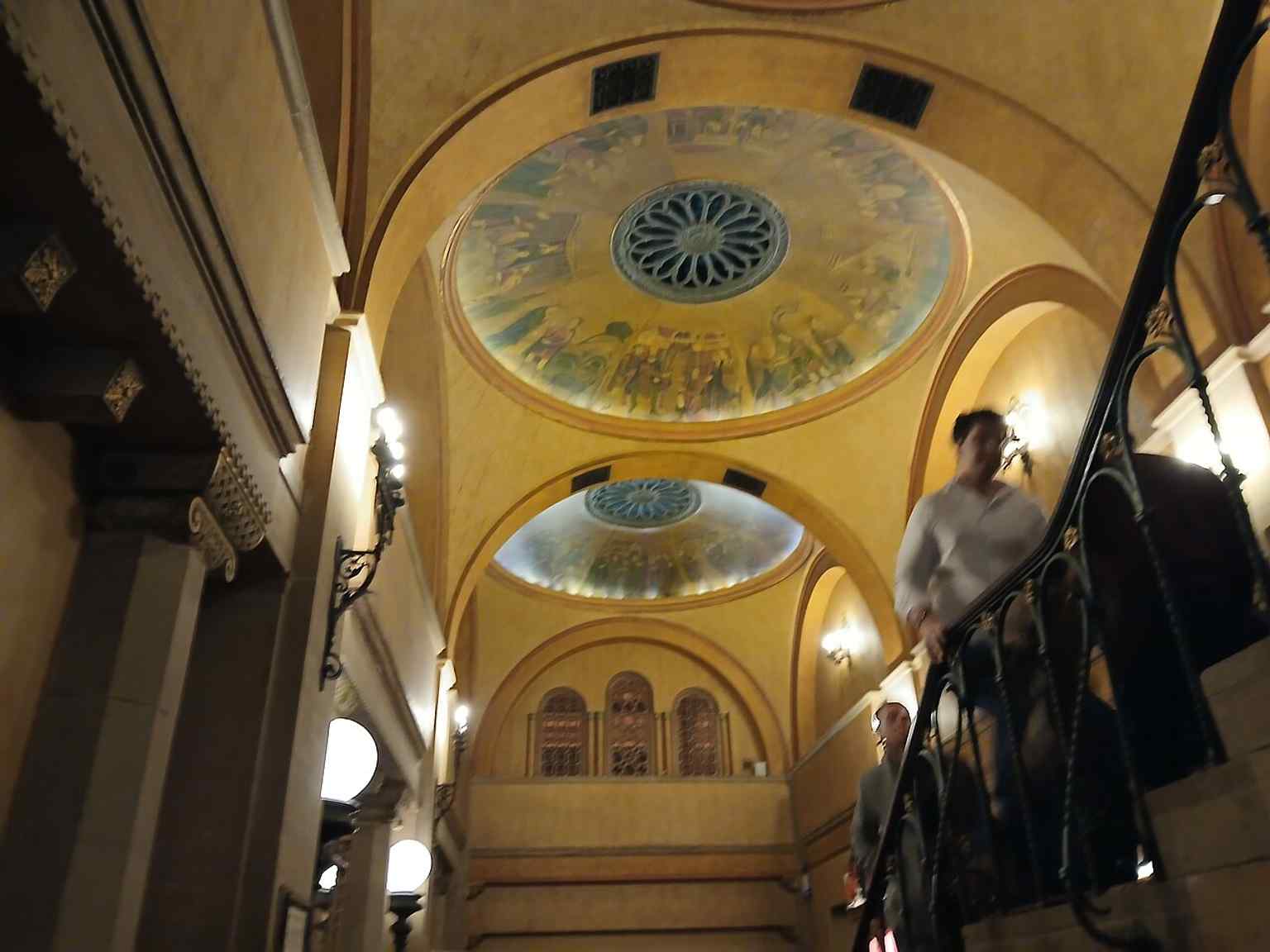 A detailed view of the side wall's ornamental plasterwork, showcasing the distinctive Moorish and Byzantine motifs used throughout the theatre's interior.