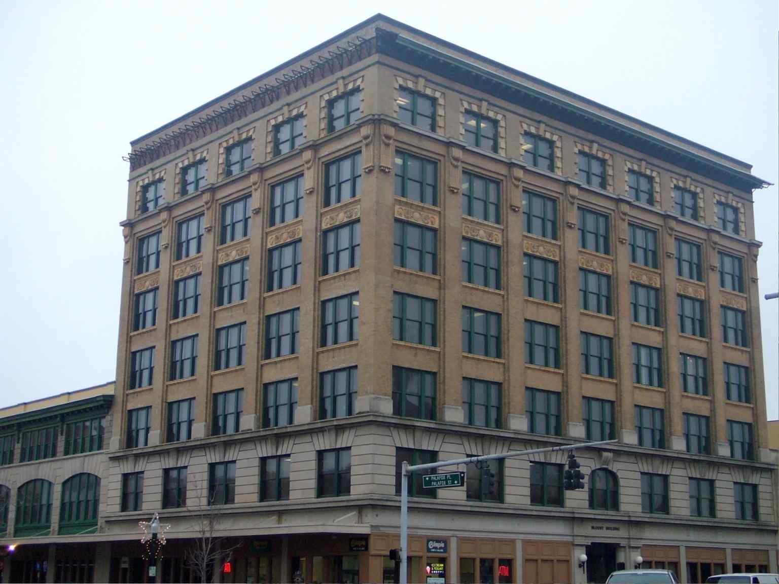 A closer look at the Blount Building's tan brick facade, standing as a testament to Pensacola's rapid reconstruction and civil rights history. (2007)