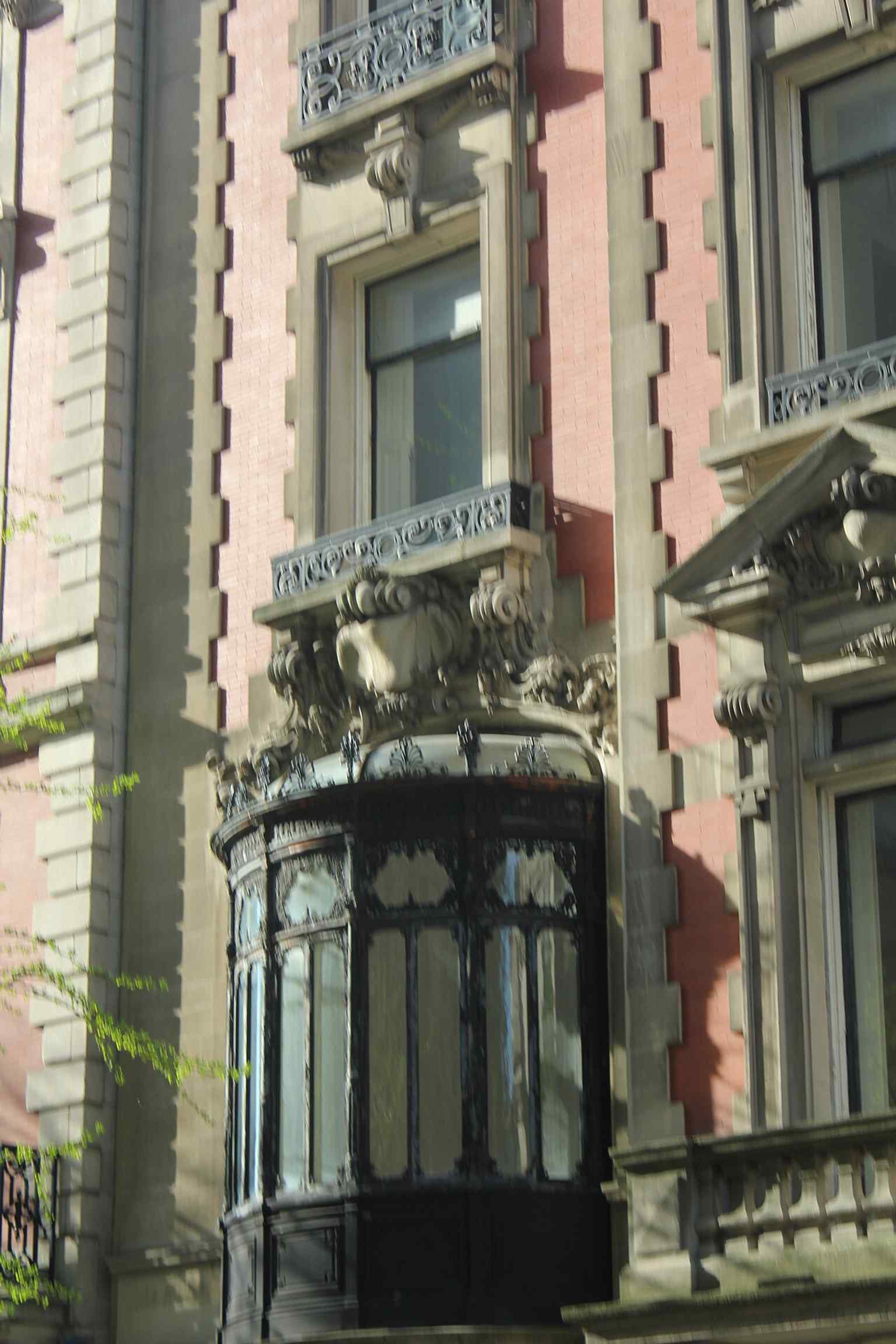 This image highlights the unique oriel window on the eastern end of the 82nd Street facade, a feature that was described as resembling a conservatory.