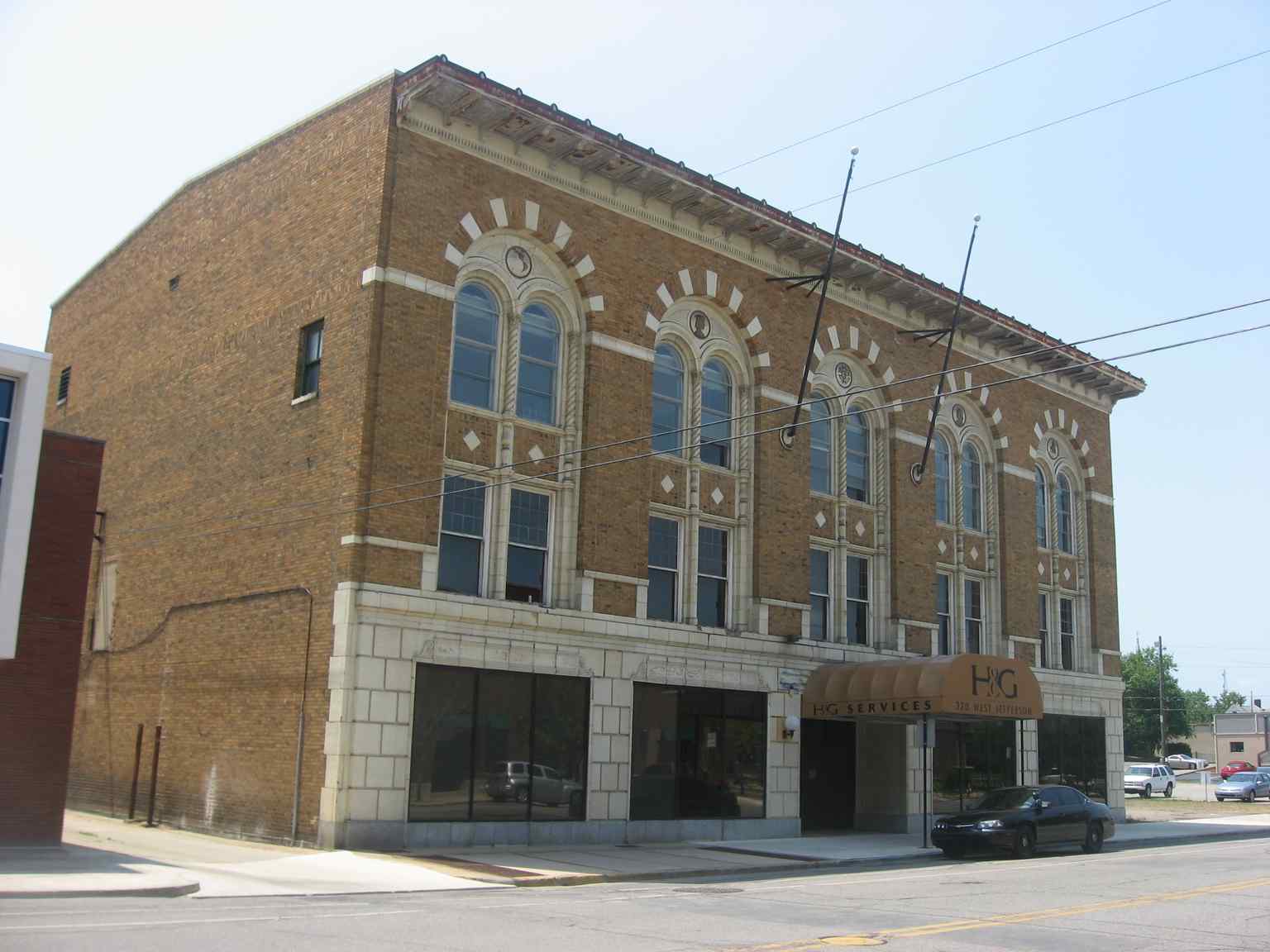 The Knights of Columbus-Indiana Club, a three-story Renaissance Revival building constructed in 1924, showcasing its distinct brick and terra cotta design and its status on the National Register of Historic Places.