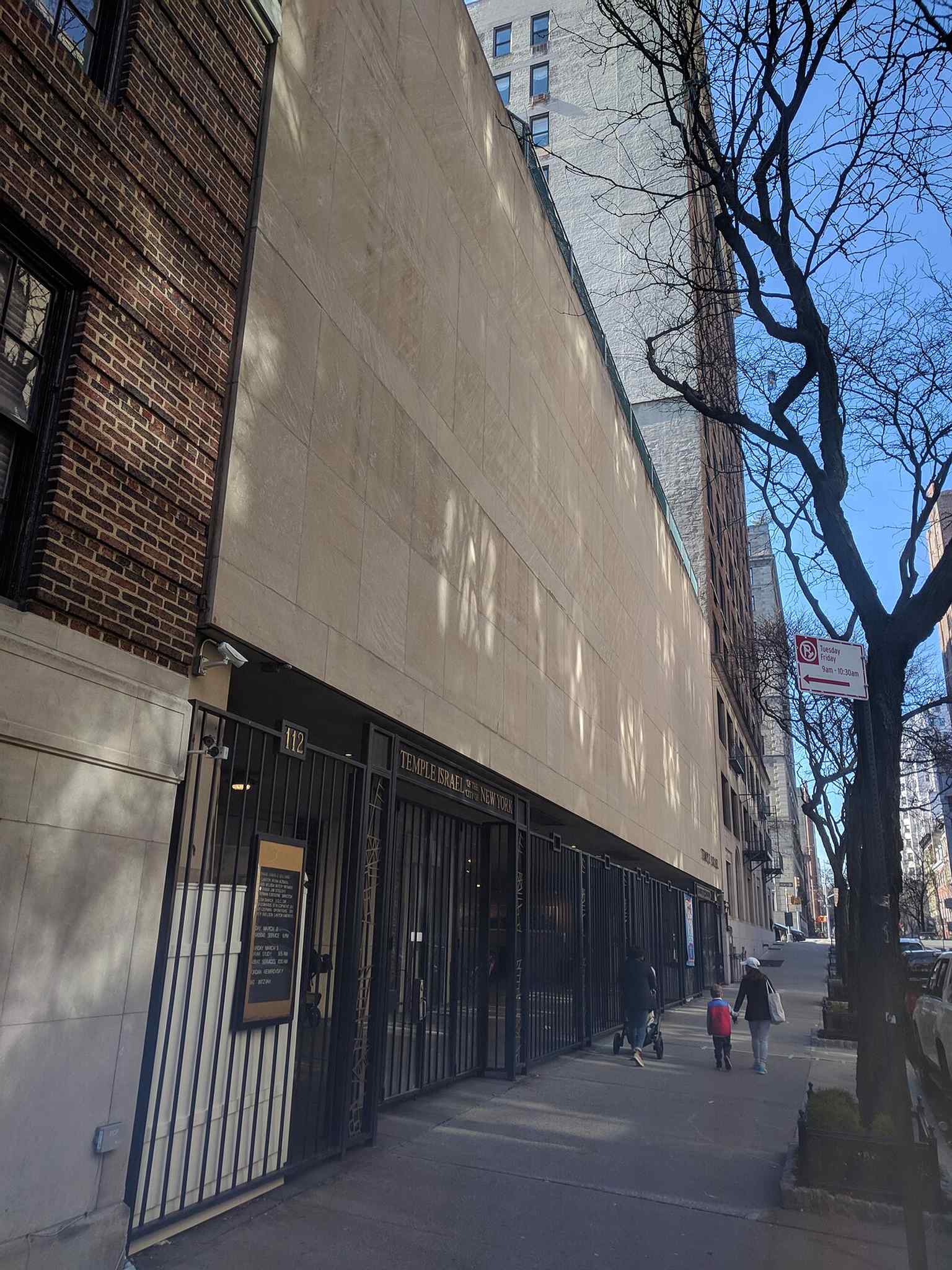 The Brutalist-style Temple Israel building on East 75th Street, completed in 1967, serves as the congregation's current home.