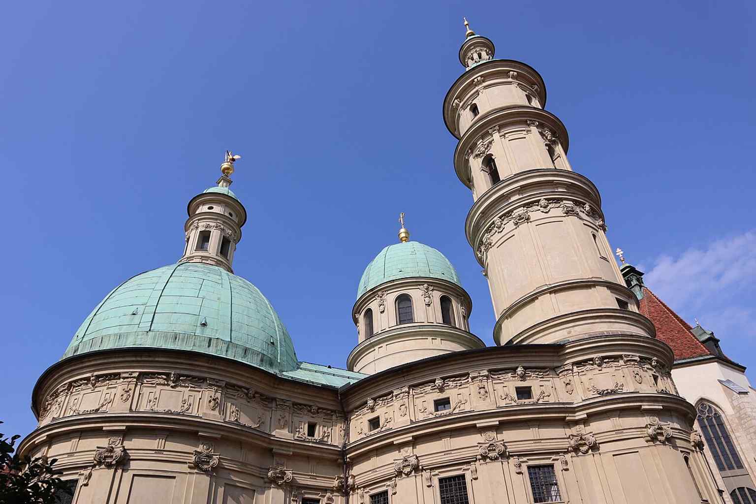 A front-facing exterior view that clearly shows the church façade and the attached mausoleum, useful for orienting visitors on the site.