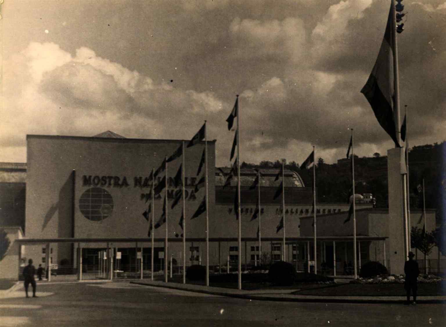 An elegant vintage view of the complex's main elevation from circa 1937, highlighting the clean lines and geometric shapes of the era.