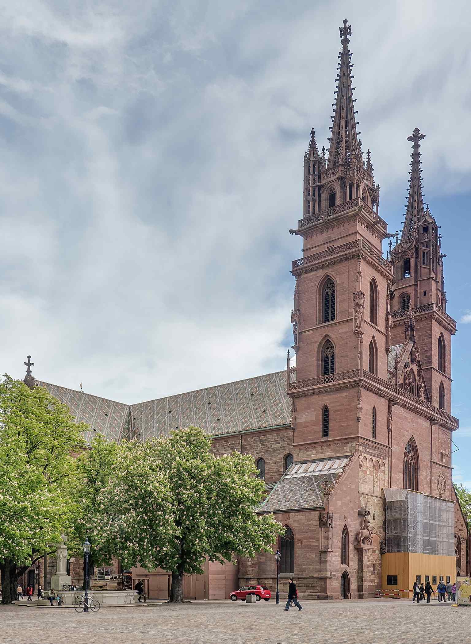 A full exterior view of Basel Minster, useful for showing the building’s overall Romanesque-Gothic character and twin-tower silhouette.