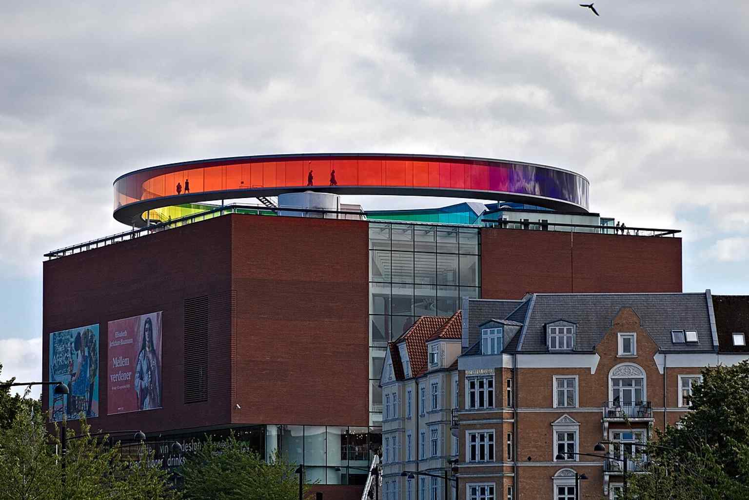 A clear rooftop view of ARoS with Your Rainbow Panorama, ideal for explaining the museum’s instantly recognizable silhouette.
