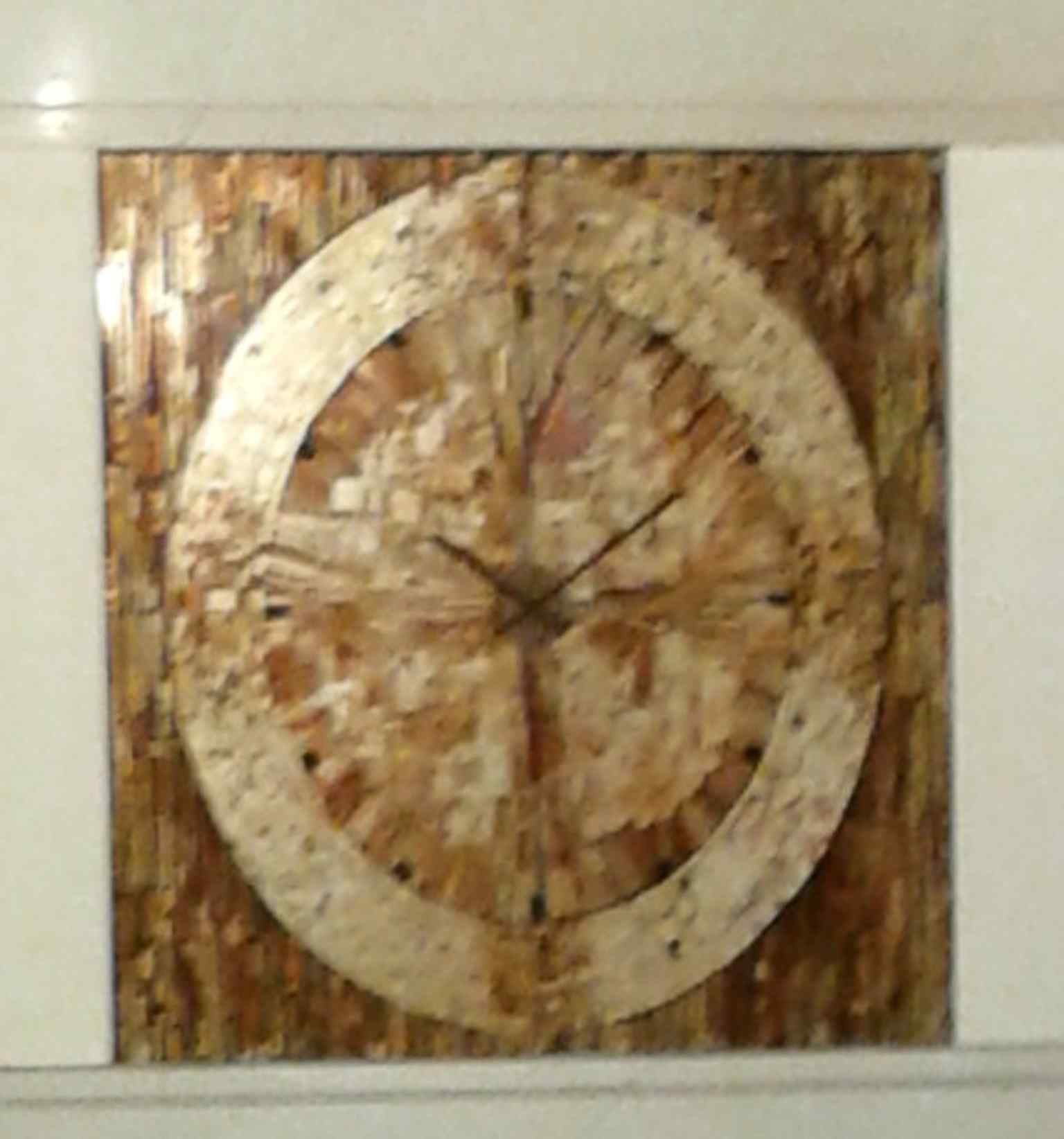 A mosaic clock inside the theatre, one of the small design details that reflects the building’s rich interior life.