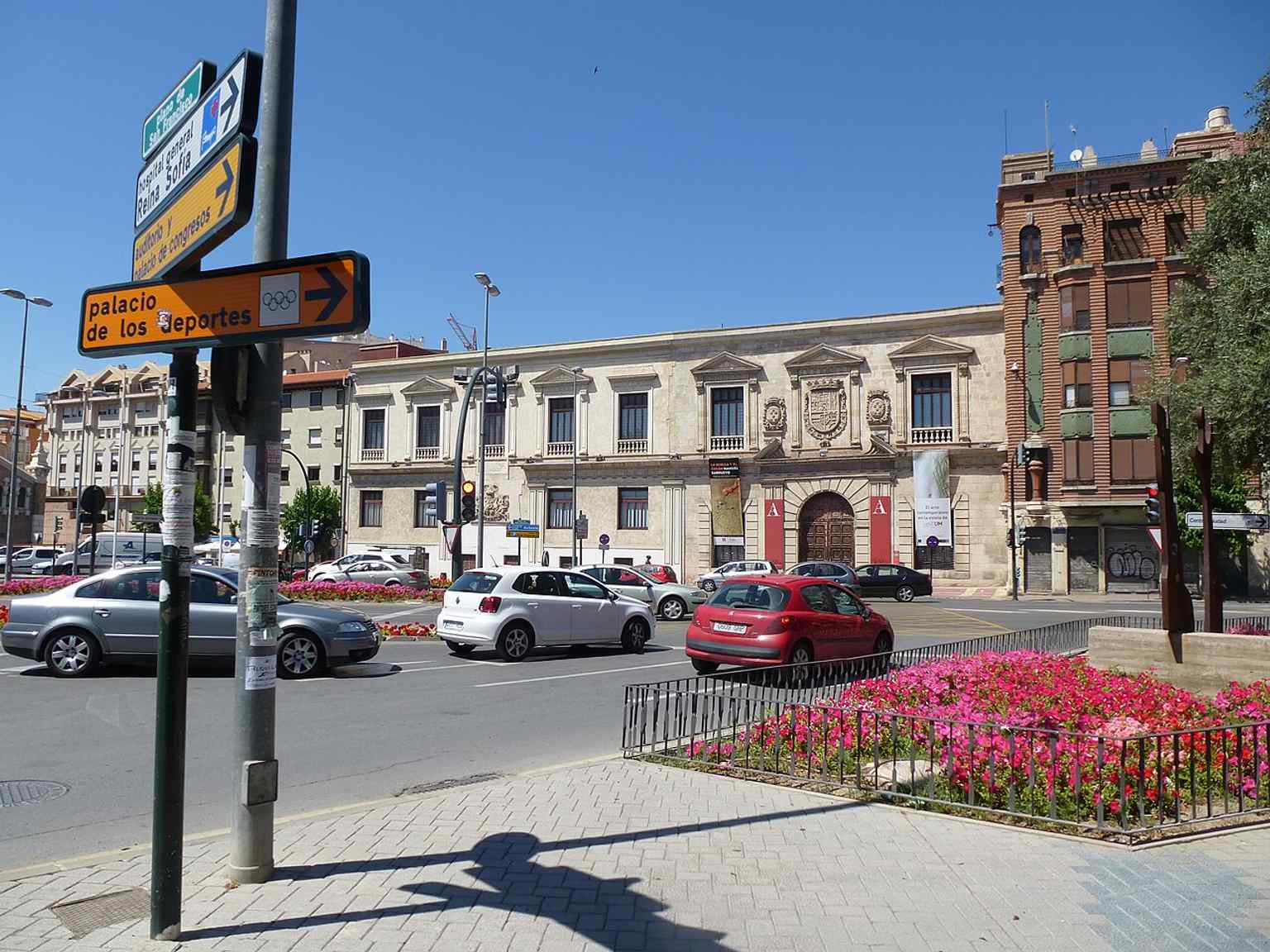 The Almudí Palace, originally a municipal wheat granary built in 1554, has served various purposes including a cavalry barracks and a Palace of Justice before becoming an exhibition hall and archive in 1985.