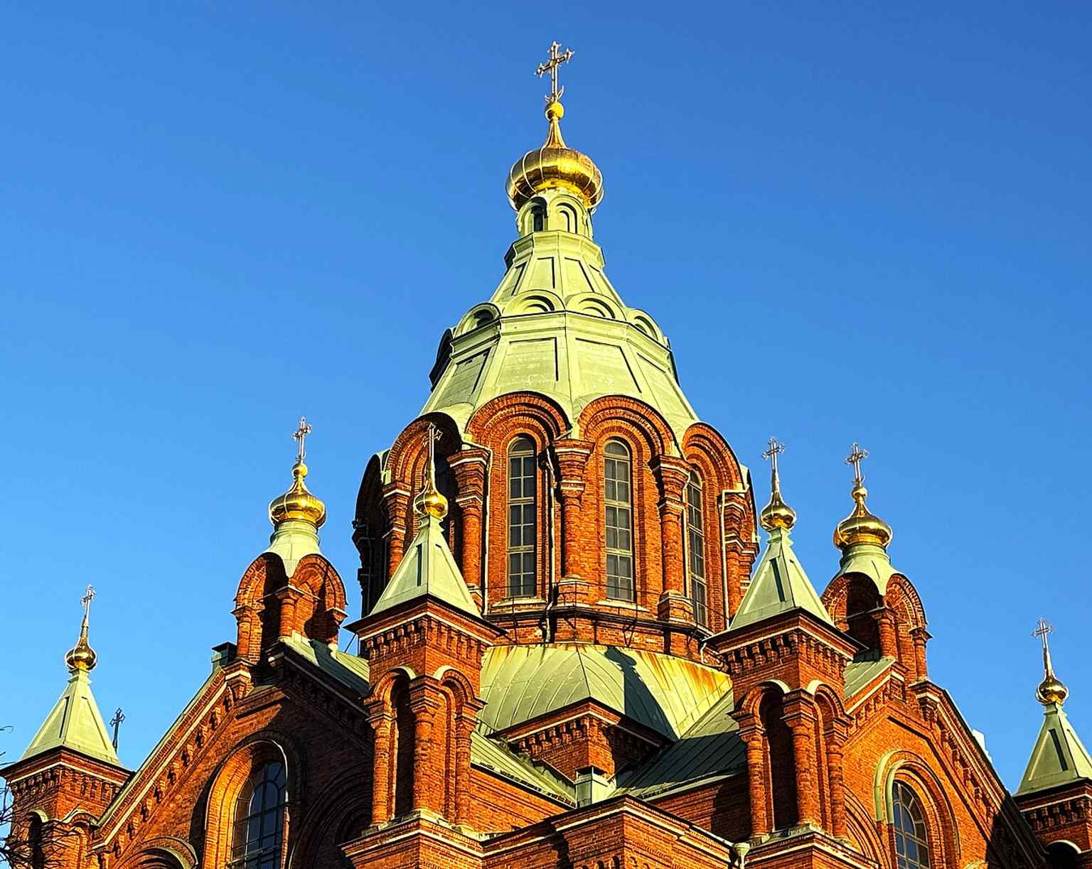 The cathedral’s gilded central dome and twelve smaller cupolas reflect the Russian-Byzantine style that makes it the largest Orthodox church in Northern and Western Europe.