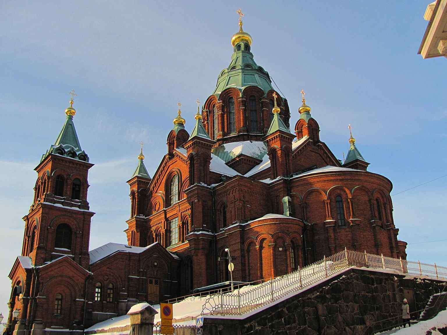 Another strong exterior angle of the cathedral, useful for showing its layered massing and the many domes that symbolize Christ and the apostles.