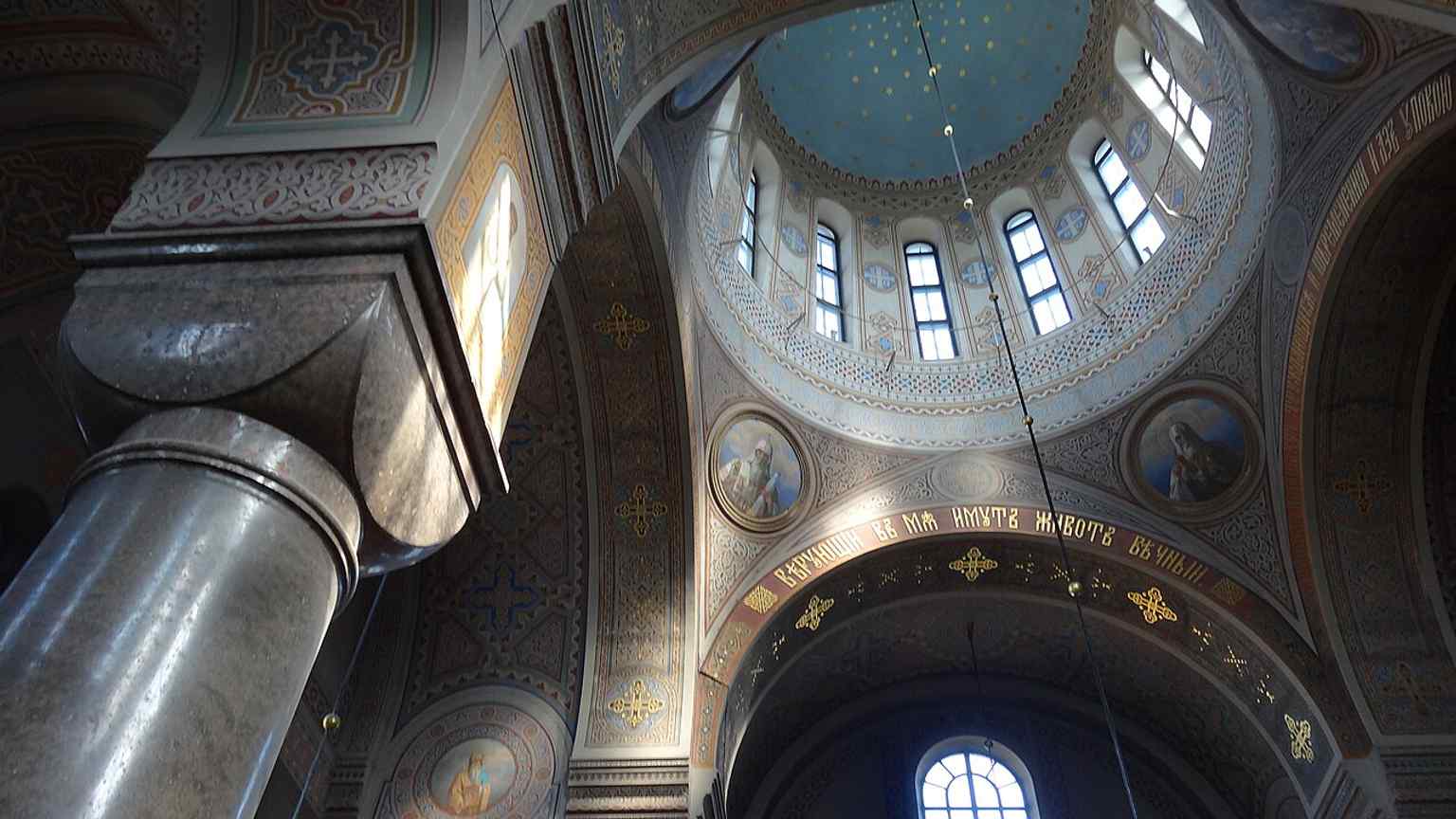 The nave interior reveals the cathedral’s spacious layout, designed for Orthodox worship without pews and centered on the iconostasis.