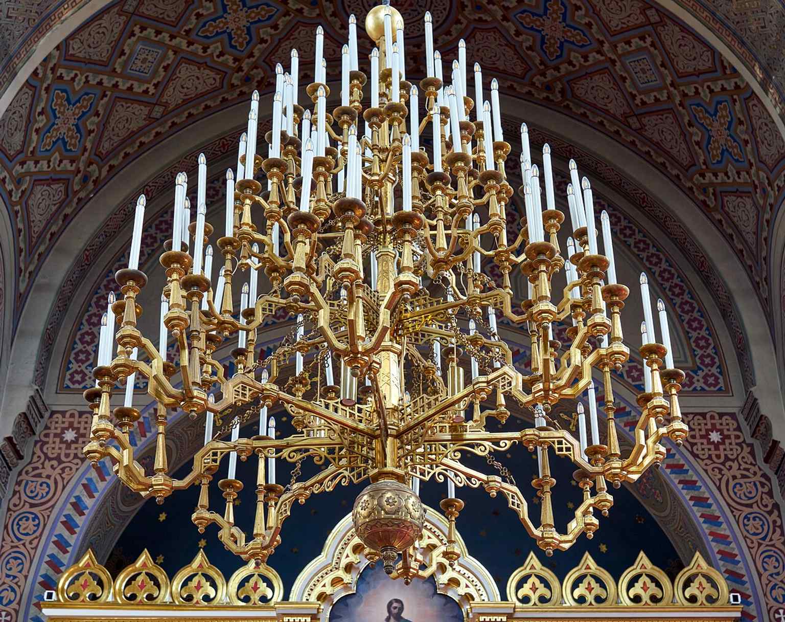A close-up of the chandelier highlights the richly decorated interior atmosphere that complements the cathedral’s icon-filled worship space.