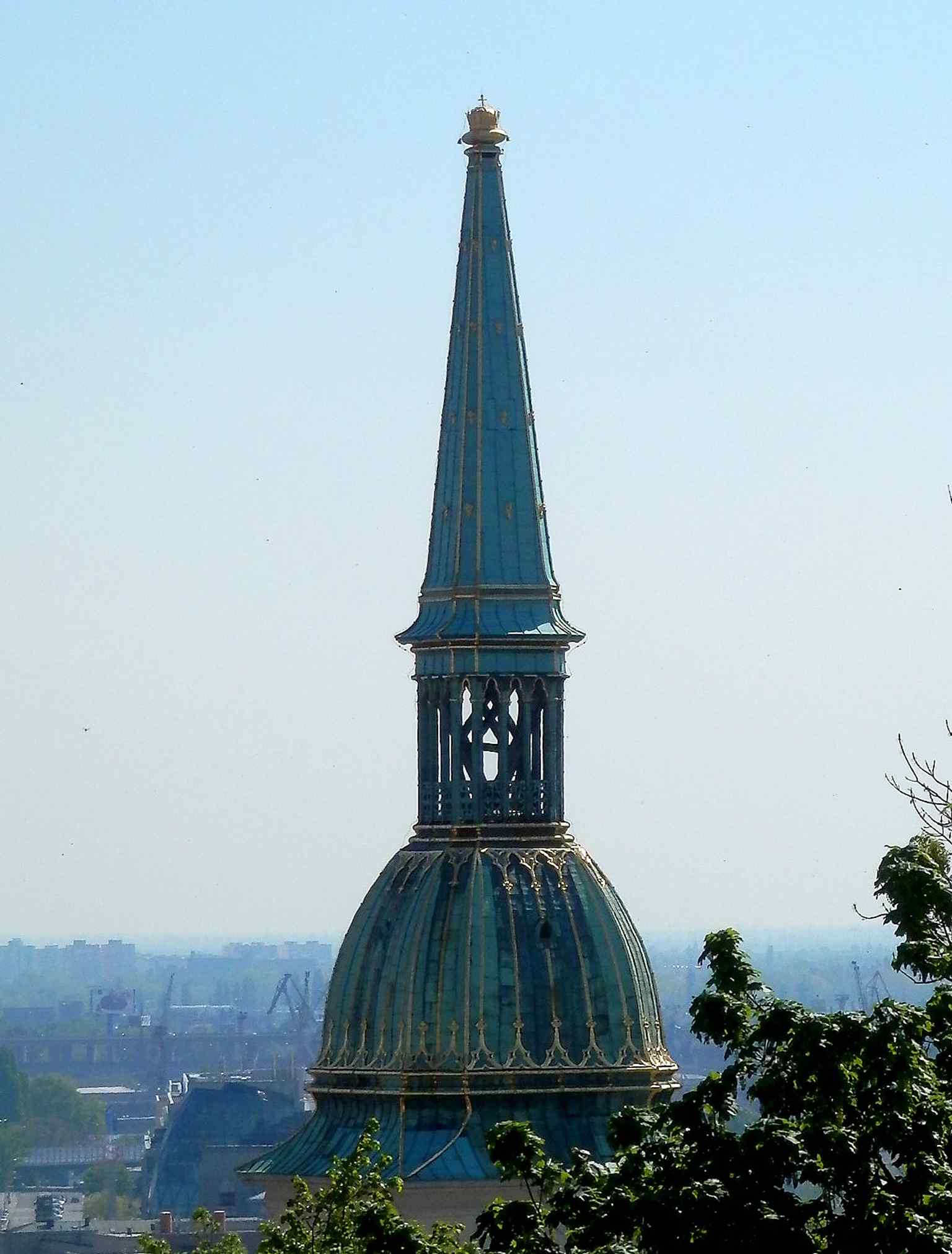 Seen from the castle side, the tower rises above the old town just as it has for centuries over Bratislava’s historic core.