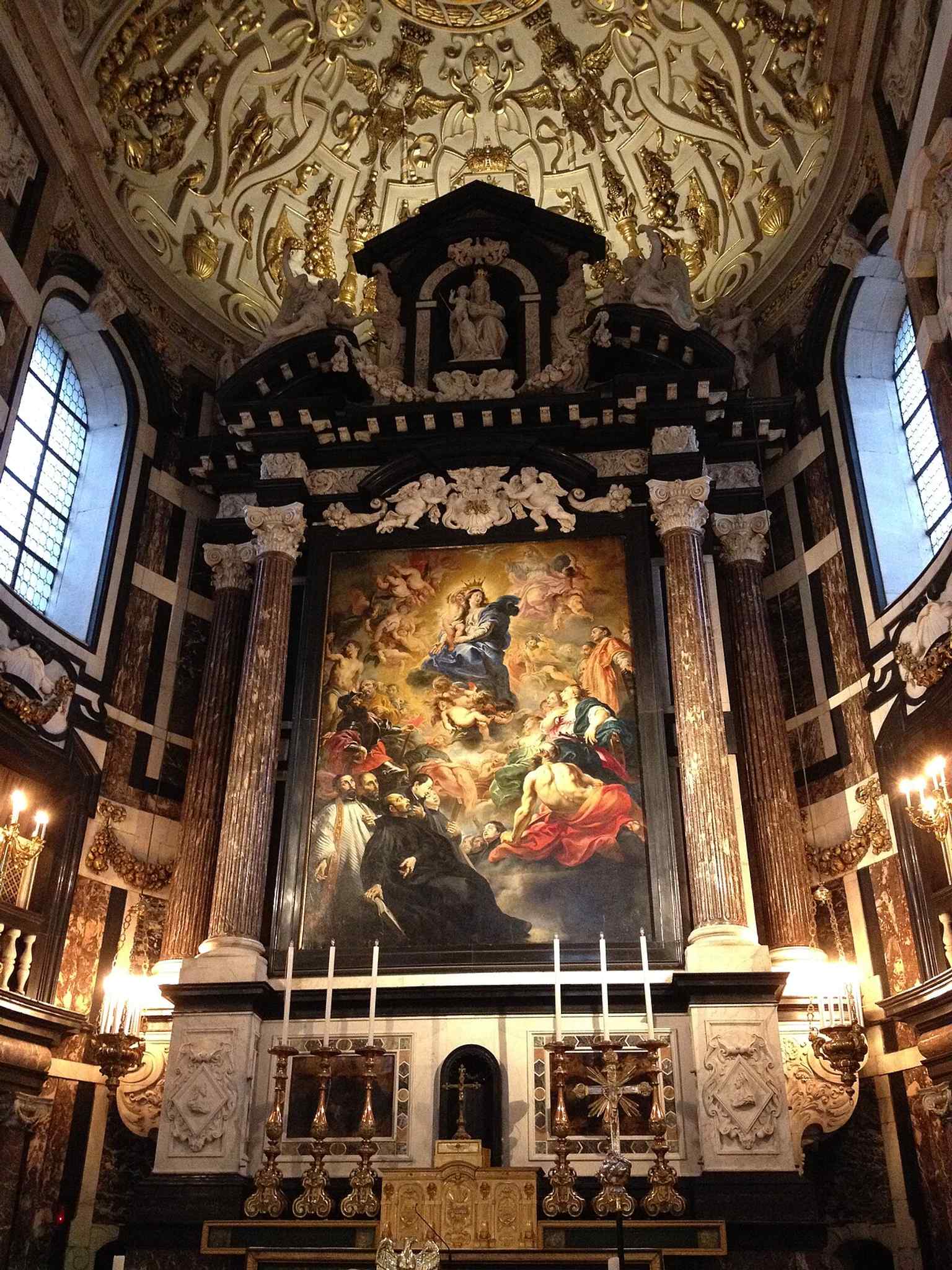 The high altar area, where an 18th-century mechanism still swaps the altarpiece several times a year.