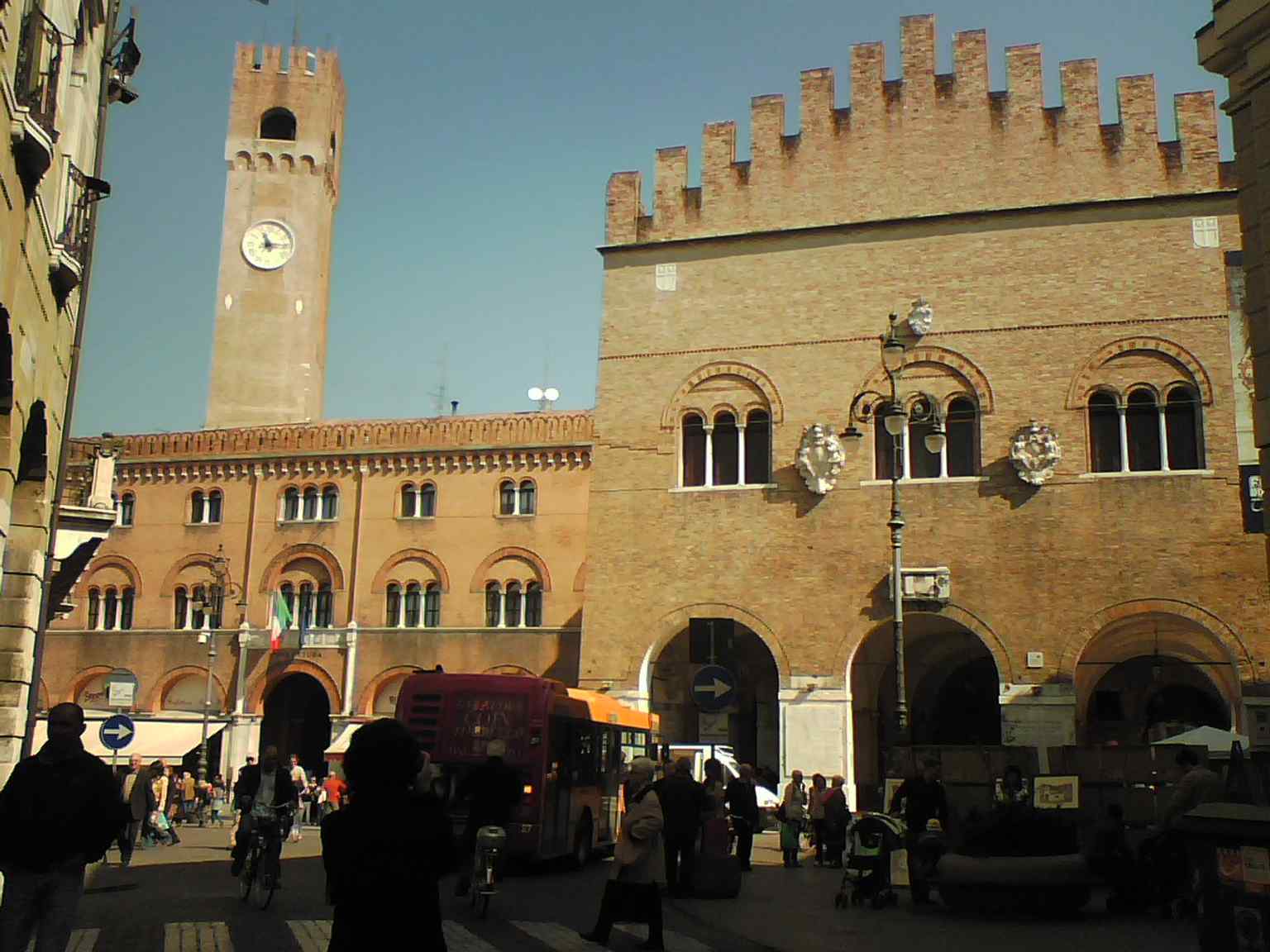 A broad view of Piazza dei Signori, the historic civic heart of Treviso framed by the city’s main medieval public buildings.