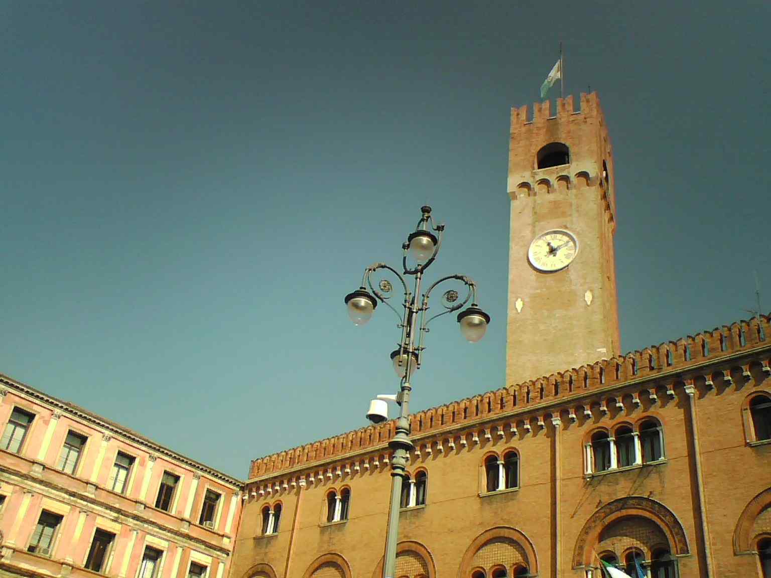The Civic Tower beside the former Palazzo del Podestà, where the Marangona bell has marked Treviso’s public life since the 14th century.