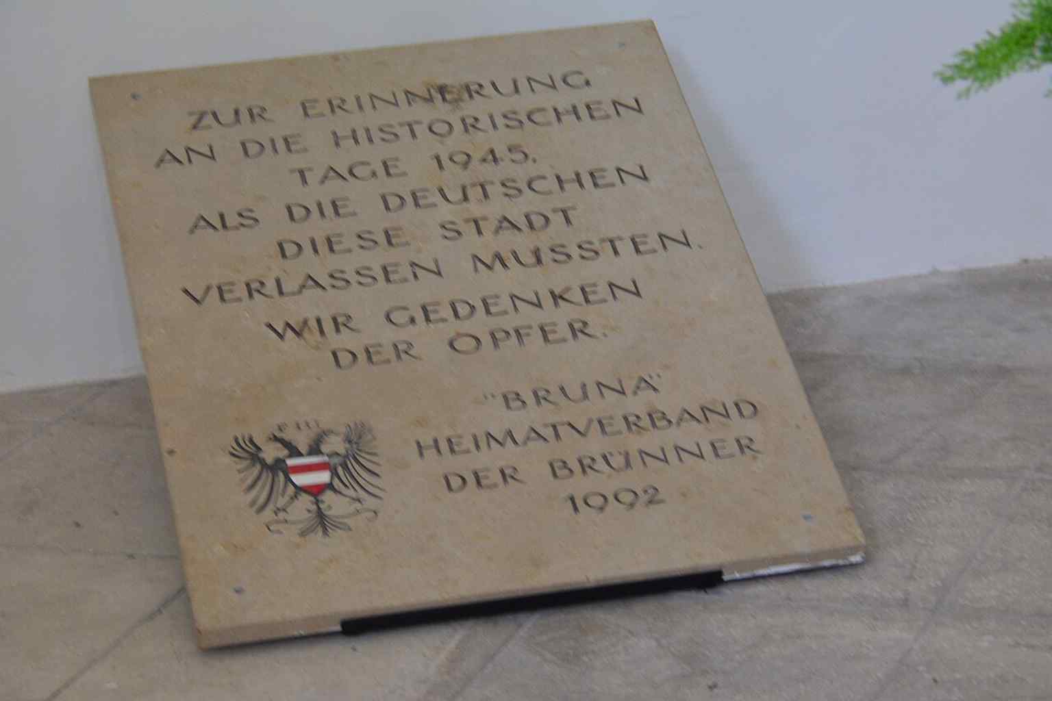 A chapel memorial for displaced German residents, showing how the church still holds 20th-century memory as well as older sacred art.