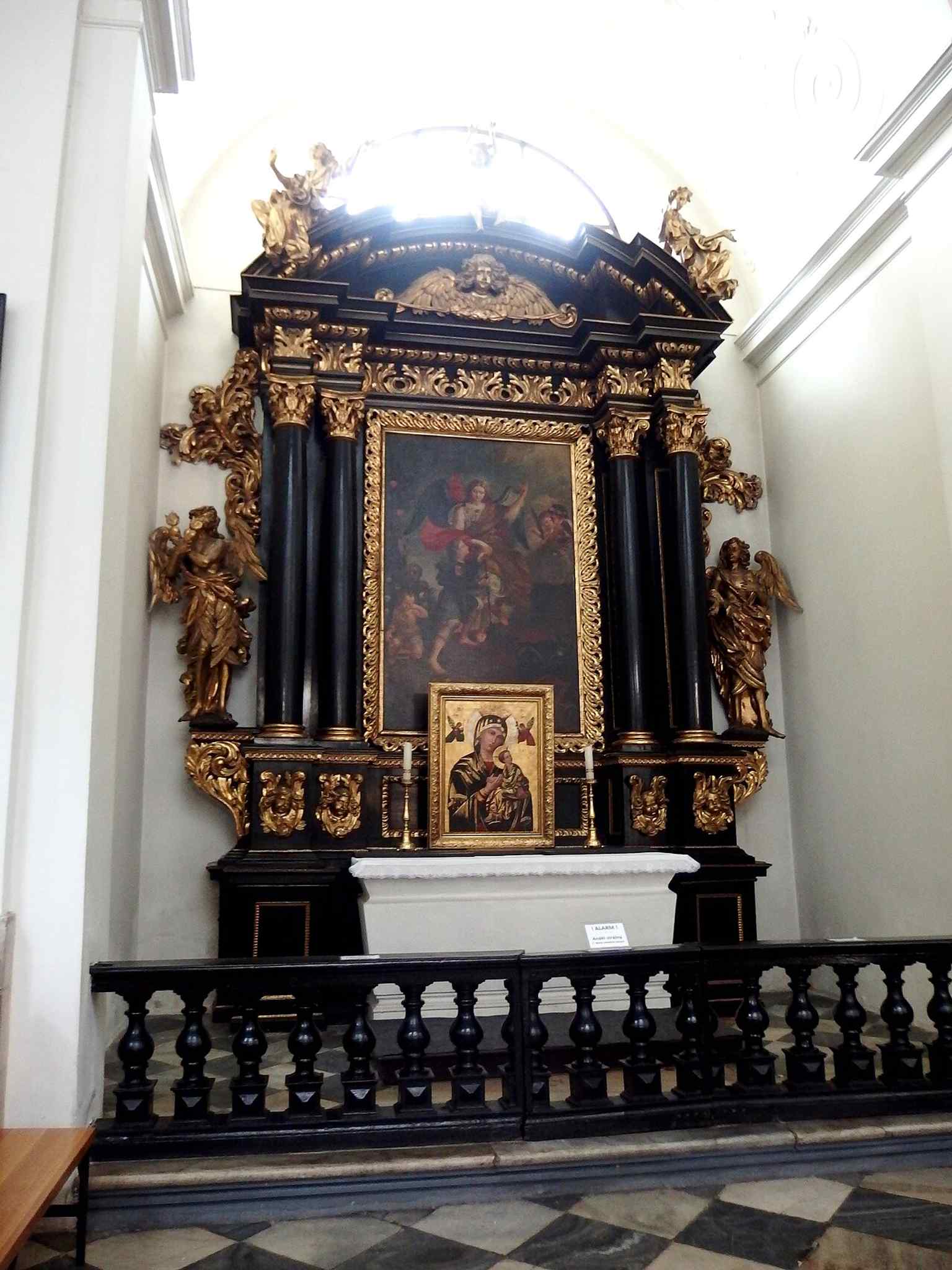 The Angel Guardian altar, one of the side altars mentioned in the interior description.