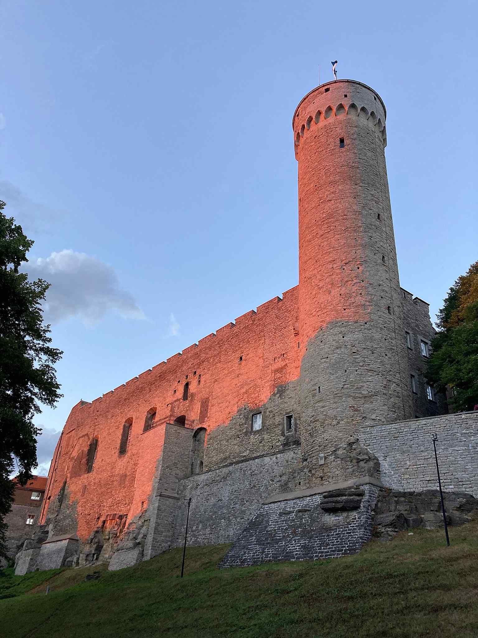 Pikk Hermann and part of Toompea Castle in evening light, showing the medieval tower that became Estonia’s daily state symbol.