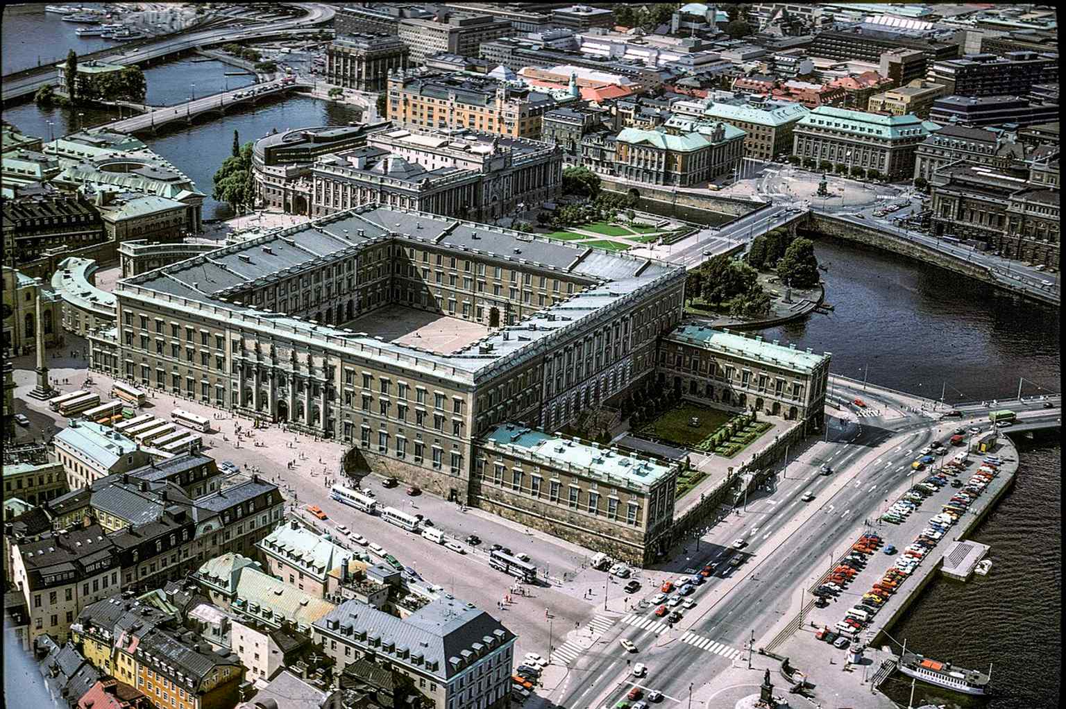 A clear aerial view of Stockholm Palace and its courtyard layout, showing how the royal complex sits between Gamla stan and the waterfront.