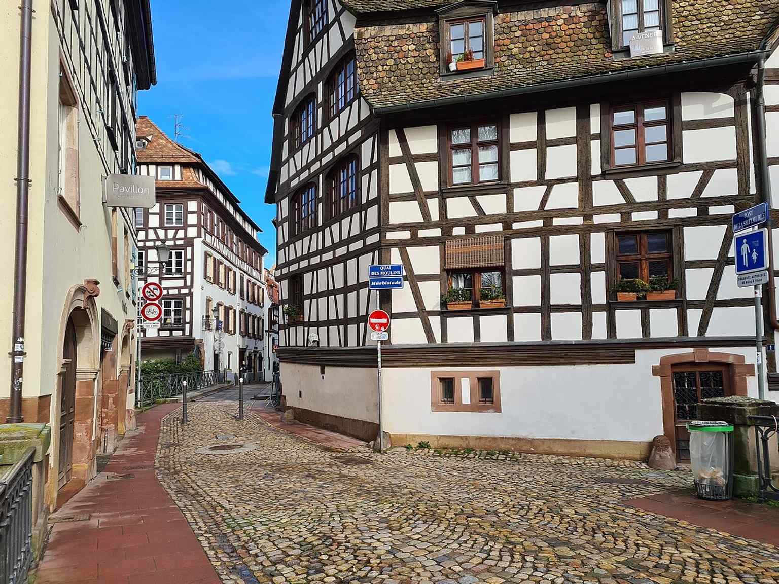 The Spitzmühle canal corner near the Pont du Faisan captures the maze of waterways that defines Petite France.