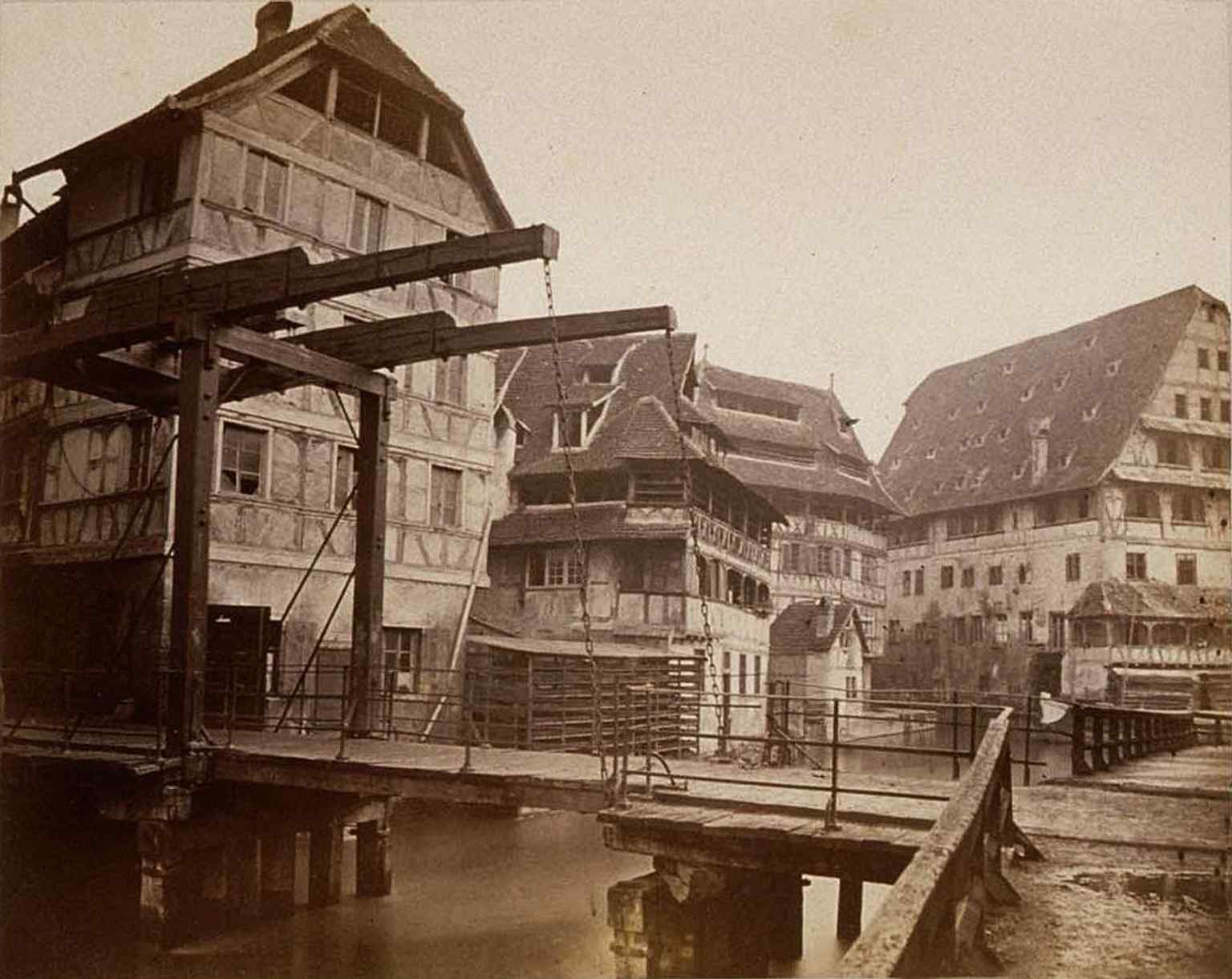 An 1871 view of the Gerbergraben area links Petite France to the older defensive waterways that once surrounded Strasbourg.