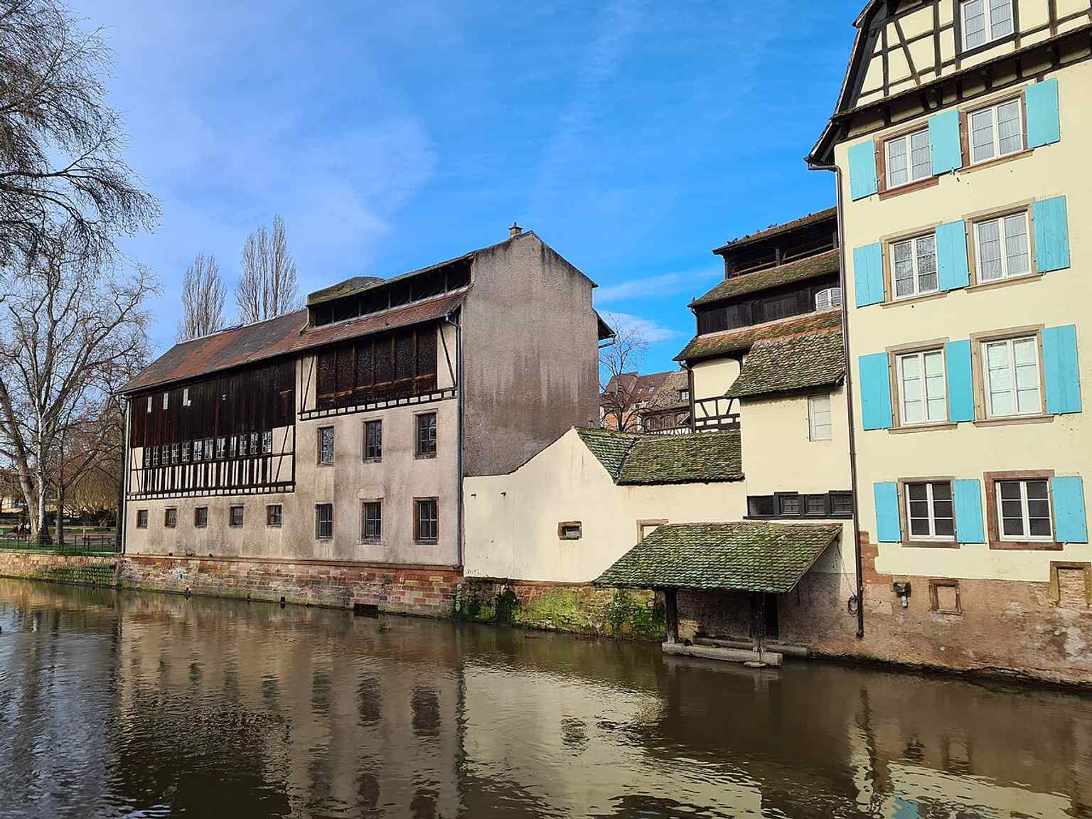 The Zornmühle canal highlights the district’s network of five channels, a key part of its historic water landscape.