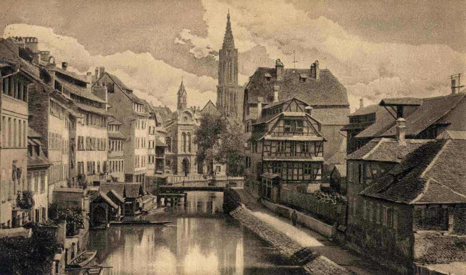 A 1930 postcard of the quai de la Petite France bridges the gap between the old artisan quarter and its tourist era.
