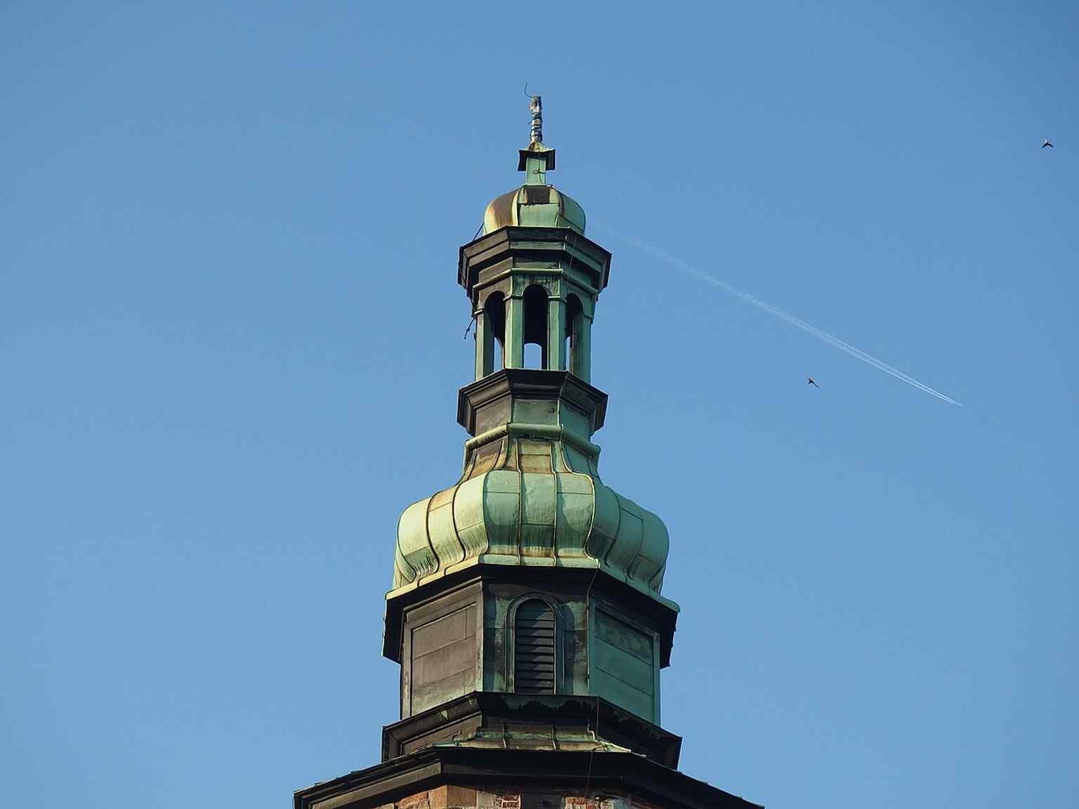 A close look at the church’s exterior masonry, ideal for emphasizing its heavy stone walls and fortress-like Romanesque character.
