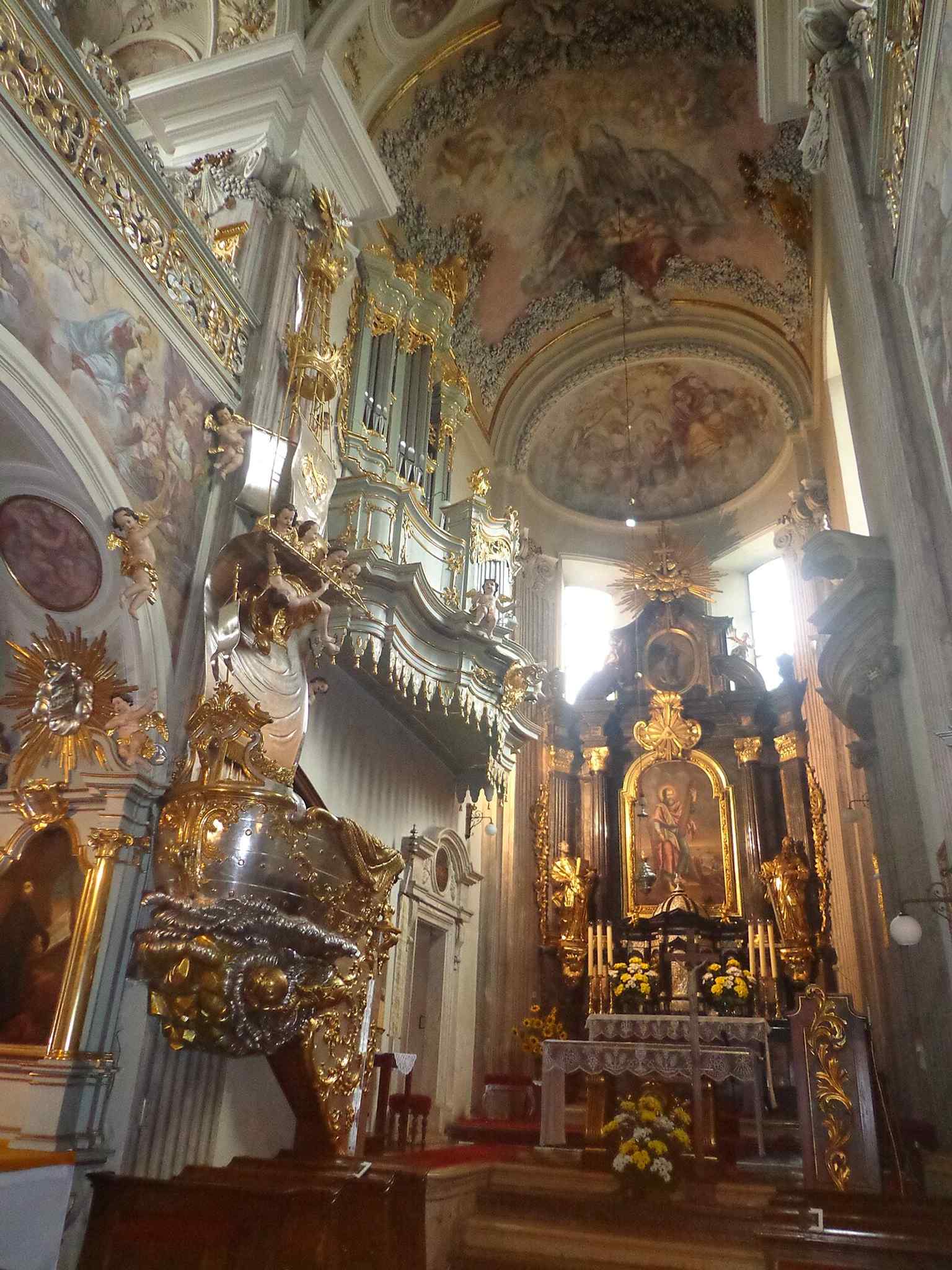 Another interior angle from 2022, useful for showing the nave’s scale and the richly decorated devotional space created after the Baroque rebuild.