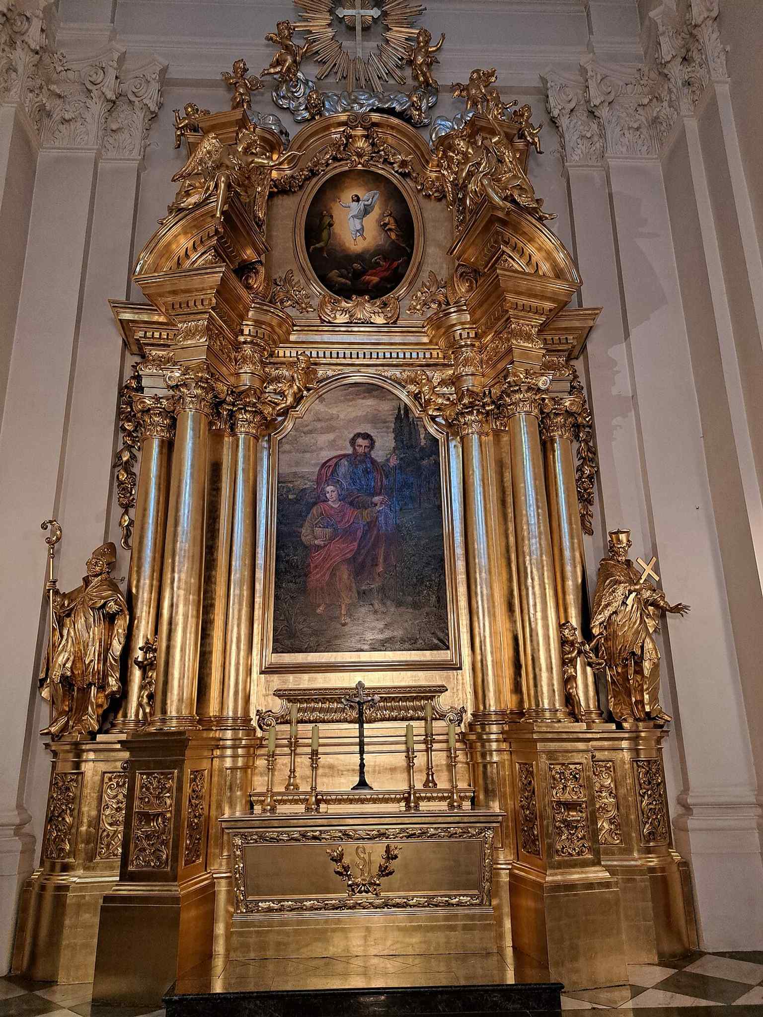 St. Joseph’s altar, one of the basilica’s restored side altars and a good example of its richly layered interior program.