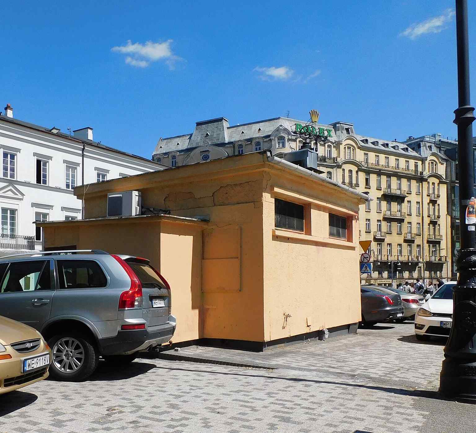A surviving former public toilet on the square — one of Warsaw’s early modern amenities, built by a French company in 1892.