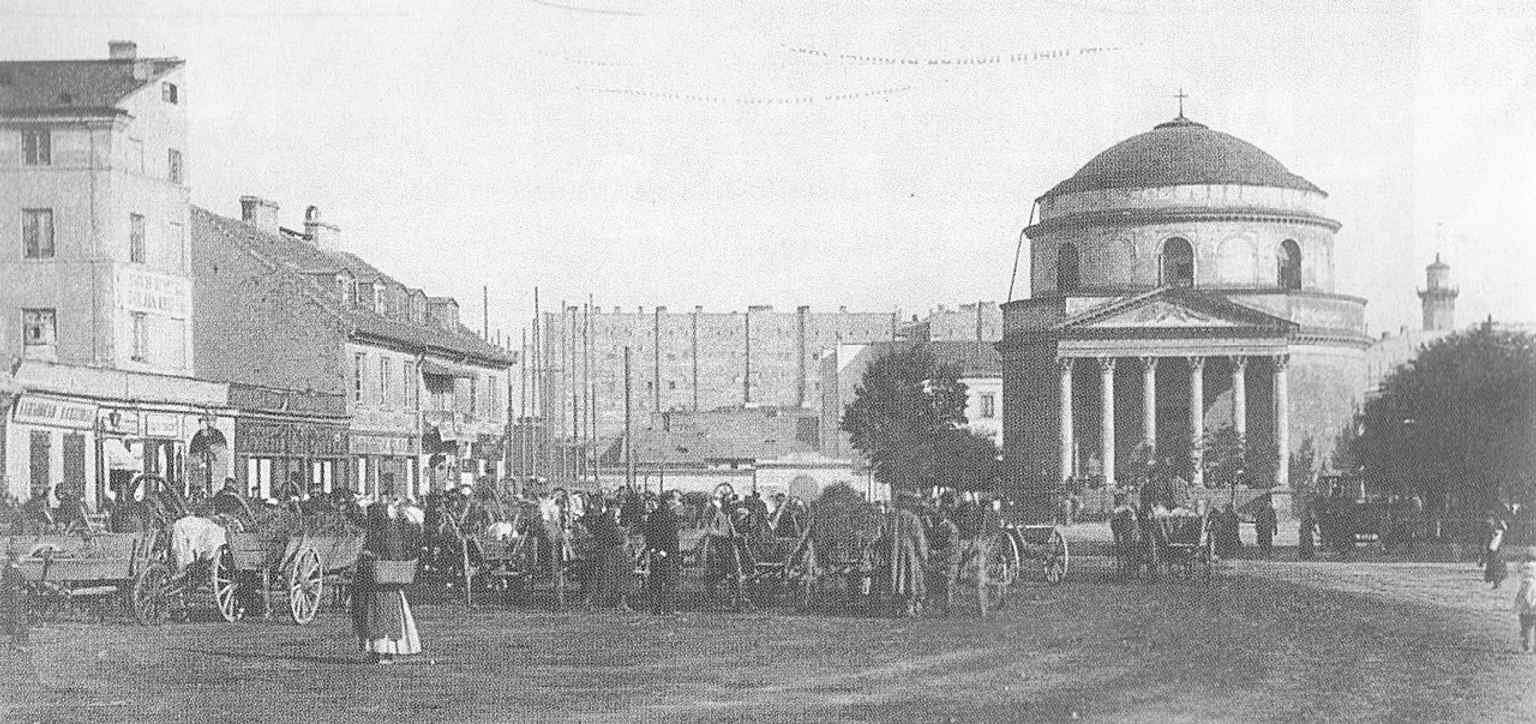 Konrad Brandel’s 1882 photograph captures the square’s 19th-century layout with St. Alexander Church on the right.