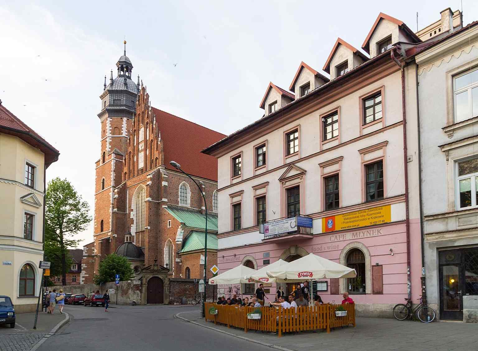 A broad view of the basilica from Kazimierz, showing the long Gothic body that grew in stages from the 14th to 15th centuries.