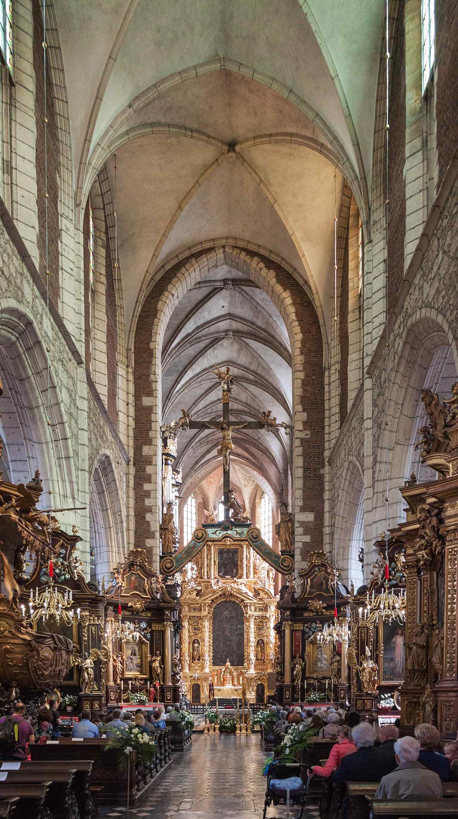 A view into the nave, where Polish Gothic structure meets the rich Baroque rebuilding that followed the Swedish Deluge.