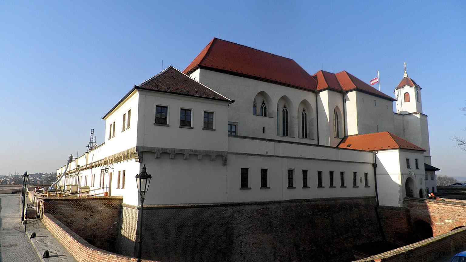 A classic view of Špilberk on its hilltop above Brno, matching the castle’s role as the city’s dominant landmark.