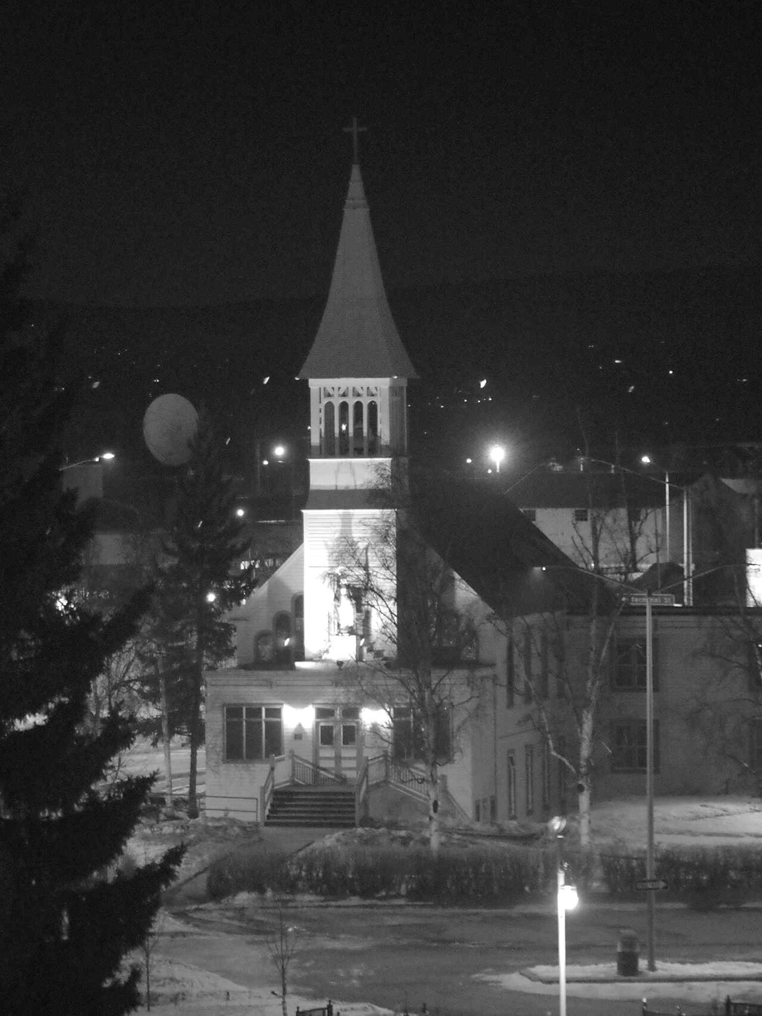 Another current exterior view showing the church’s distinctive steeple and front façade, added during the 1914 alterations.