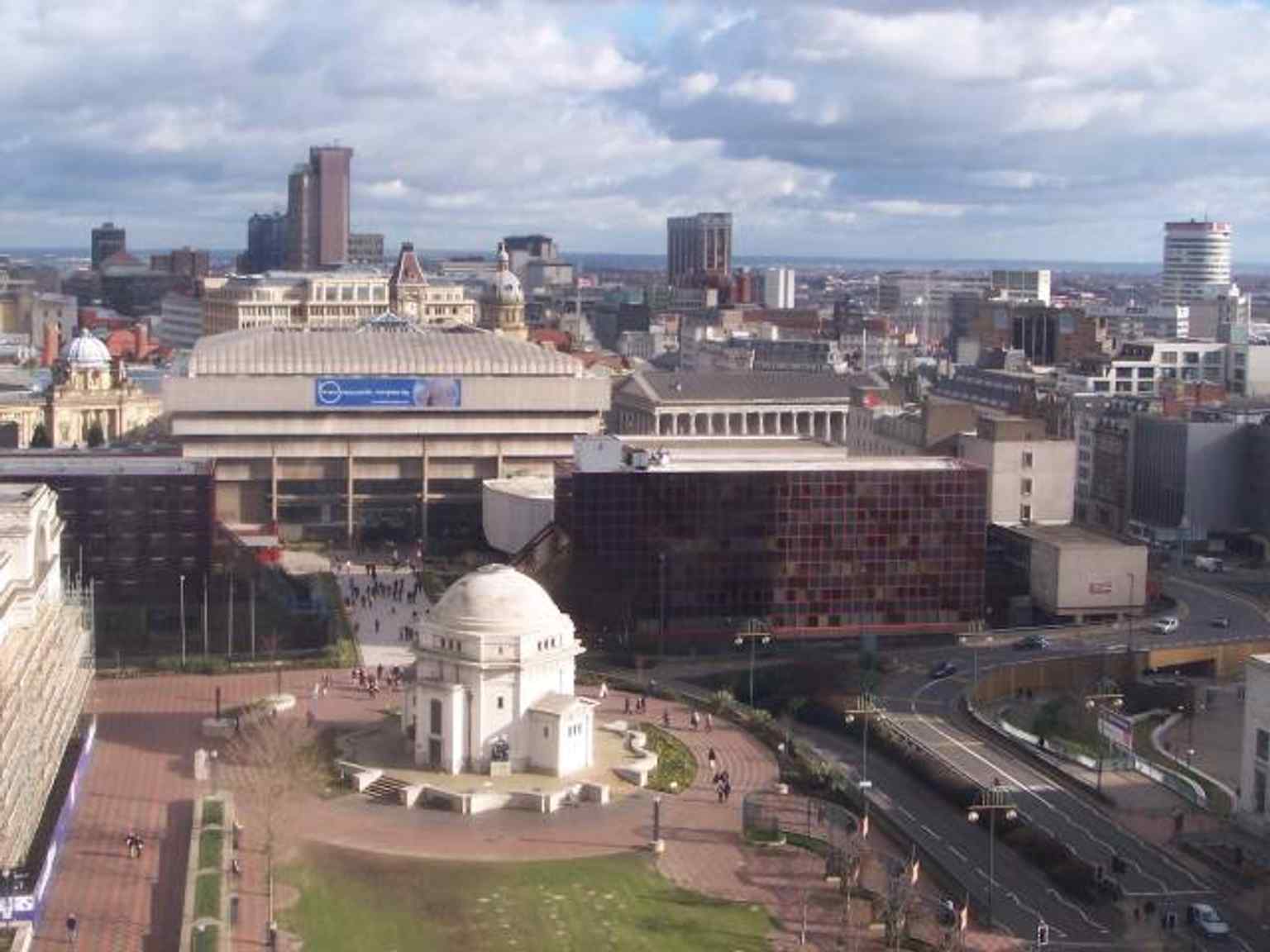 A high-level view of Centenary Square showing the Hall of Memory at the heart of Birmingham’s civic centre, with the surrounding skyline that grew around the memorial.