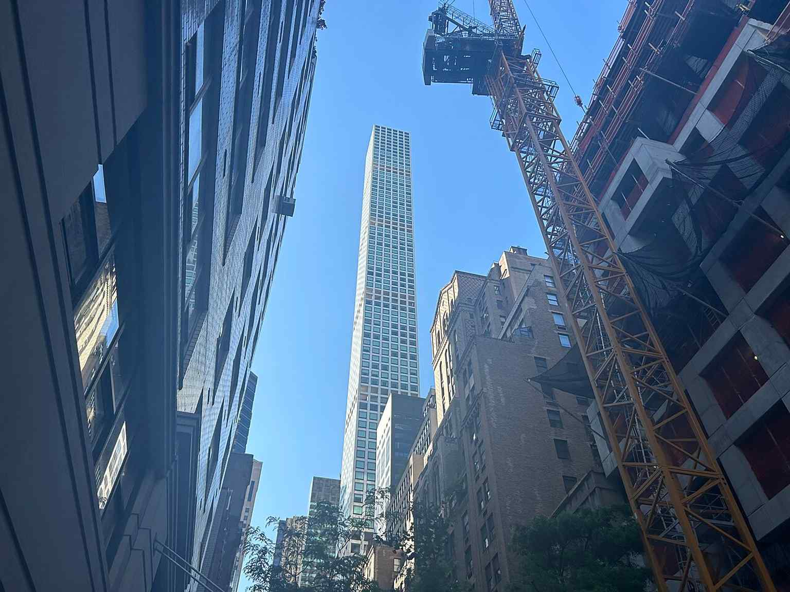 From the base on Park Avenue, highlighting the limestone-clad podium and the main street presence of the tower.
