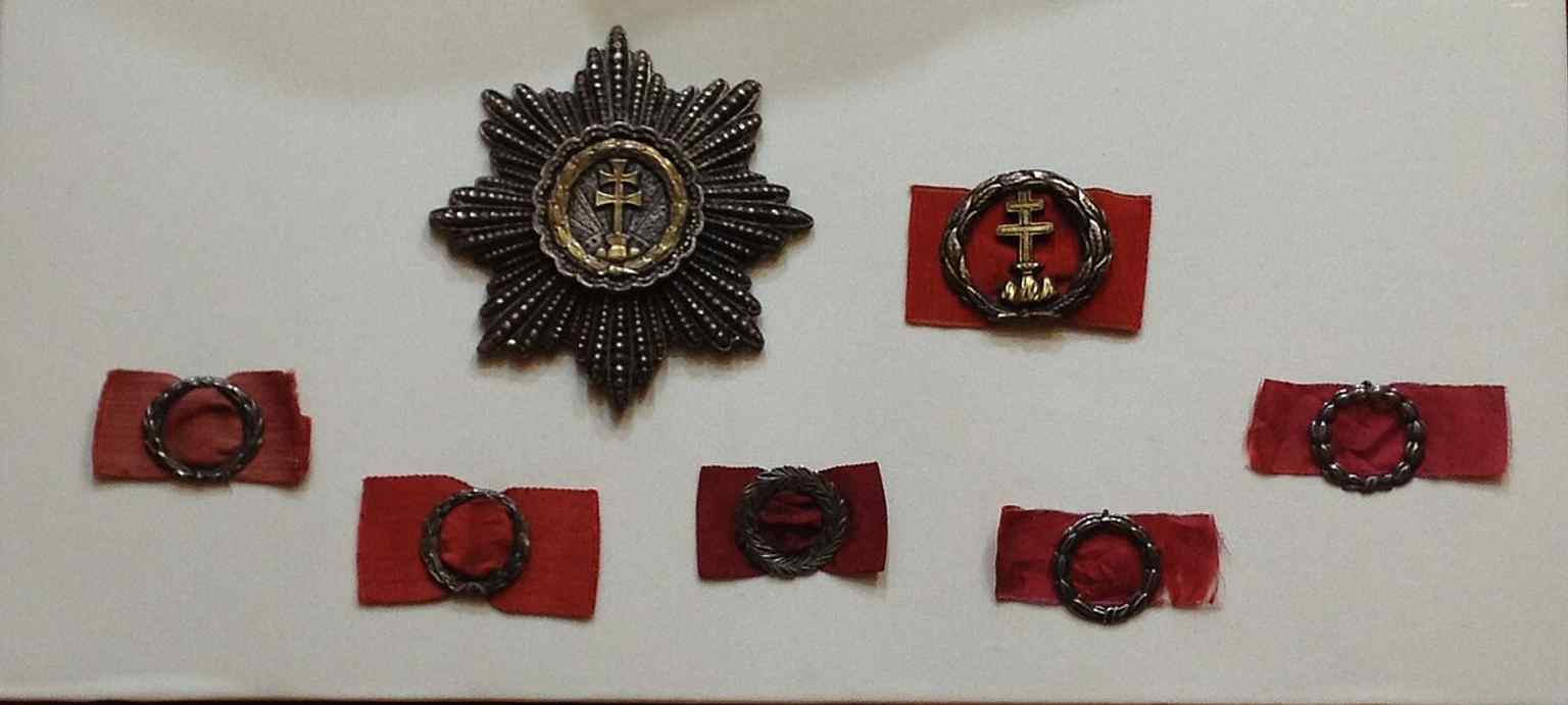 This image displays the Hungarian Order of Military Merit from 1848-49, part of the museum's extensive 28,000-piece medal collection.