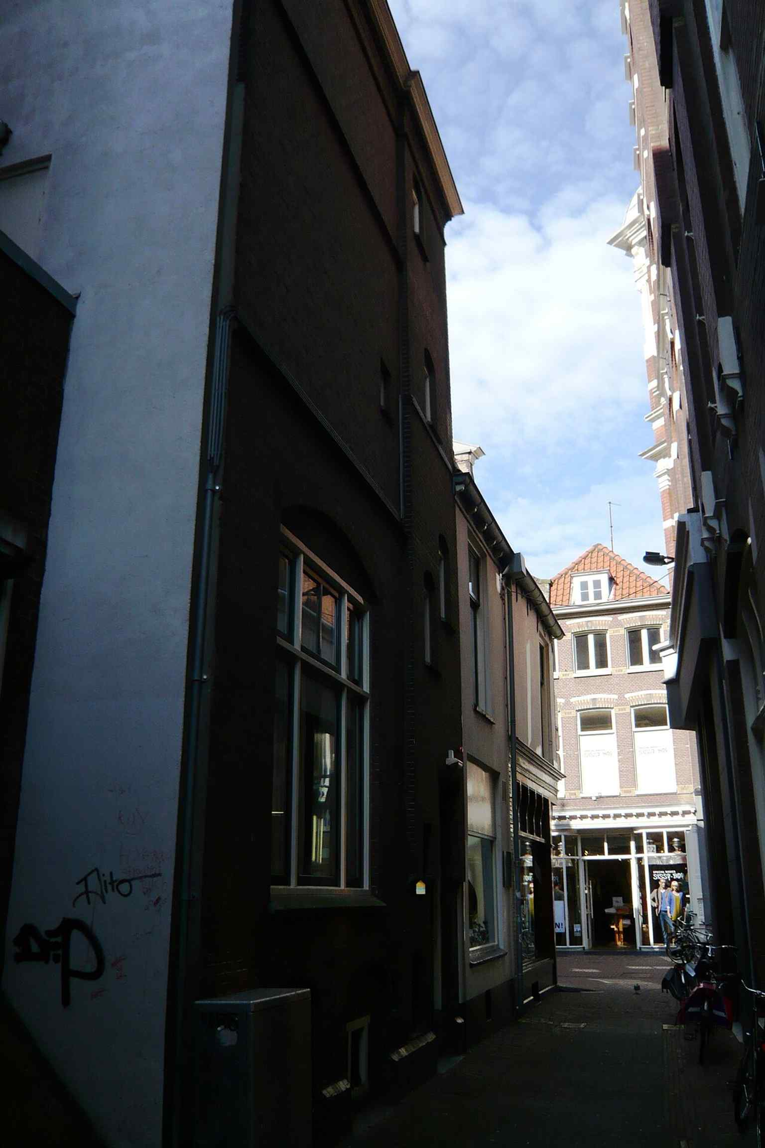 View from the Schoutensteeg alley beside the museum, showing the building where hidden refugees were sheltered during the occupation.
