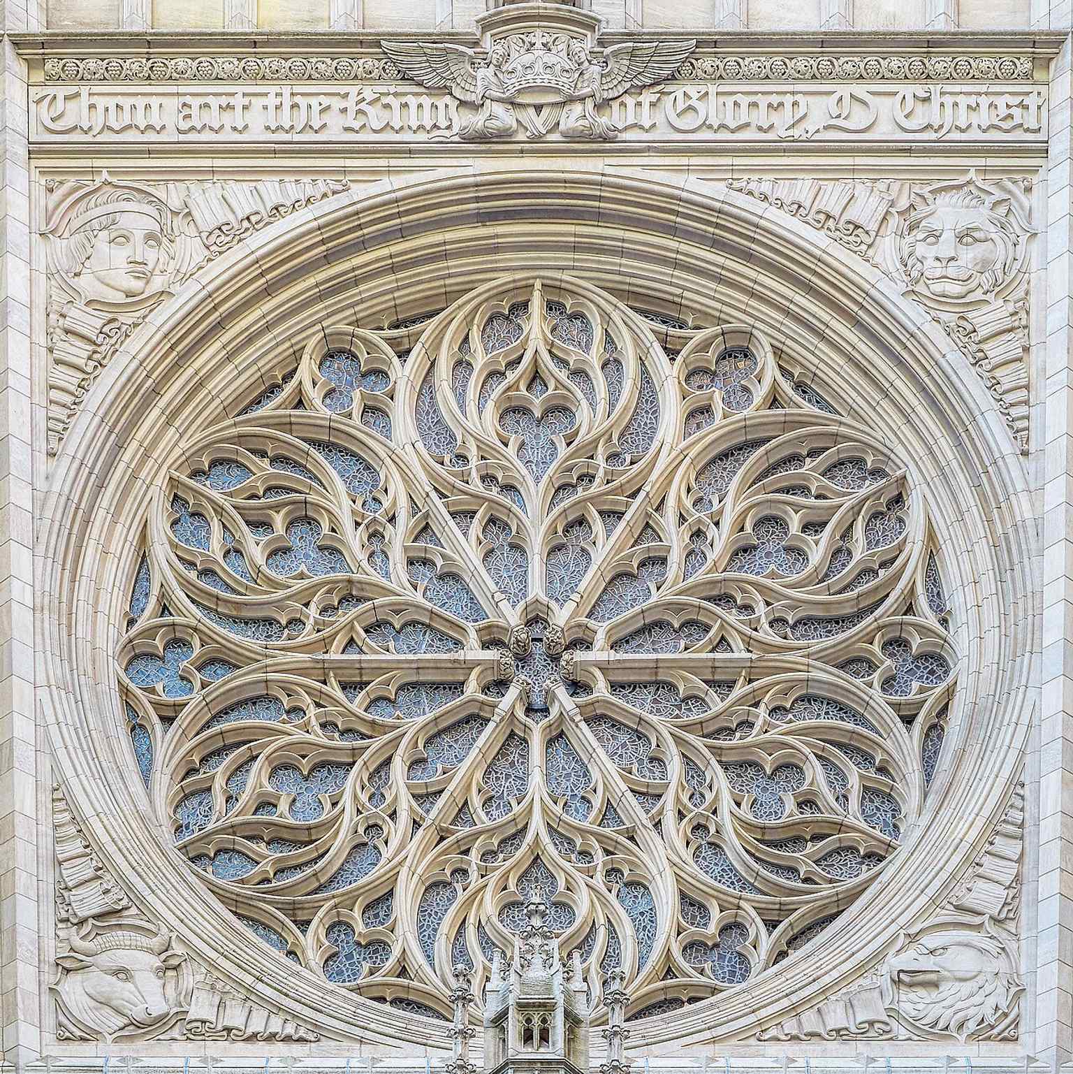 The rose window above the main entrance, a hallmark of the 1913 church’s French High Gothic design.