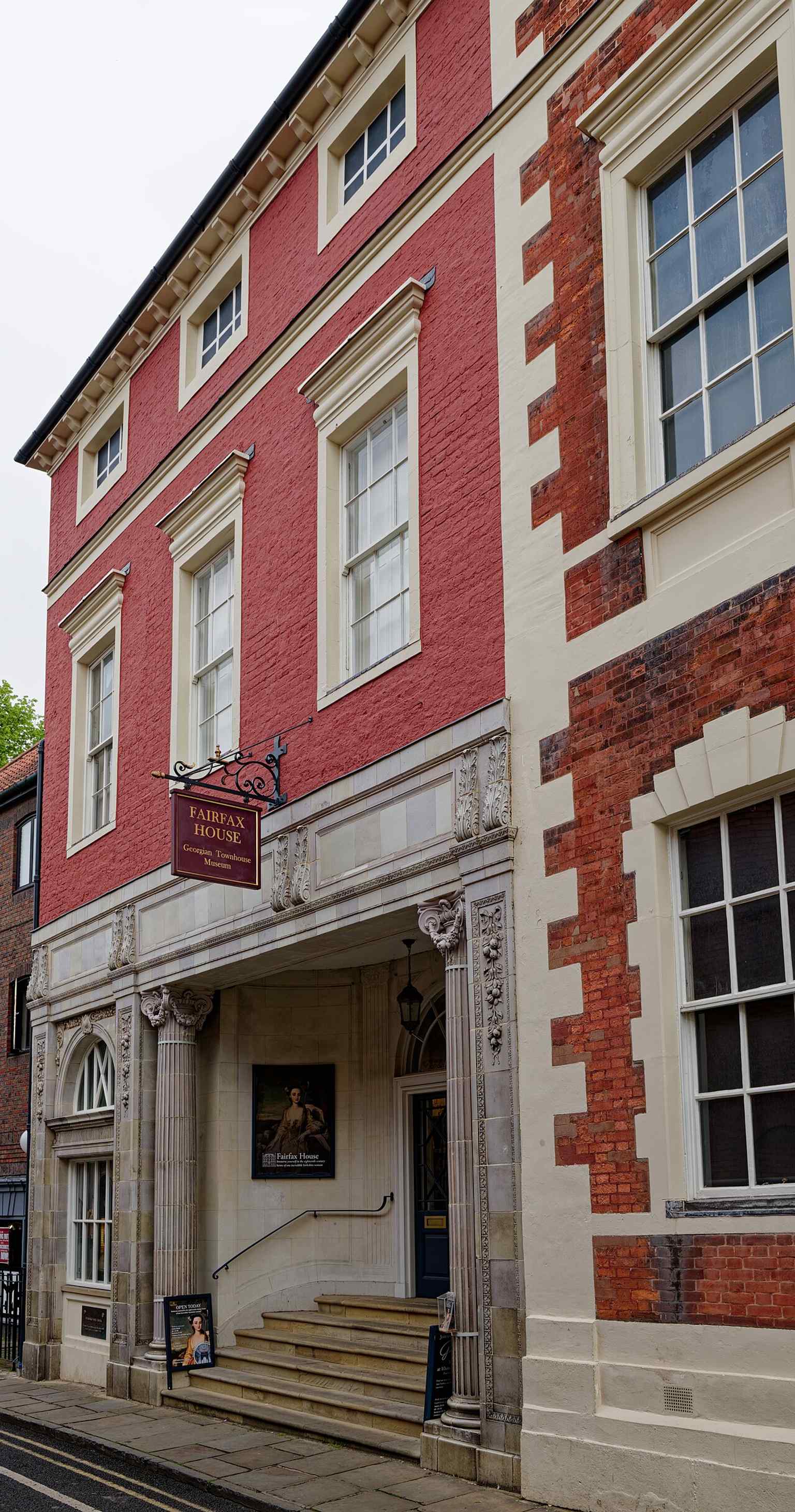A street-level view of 25 and 27 Castlegate that helps show the house in its historic city-centre setting.