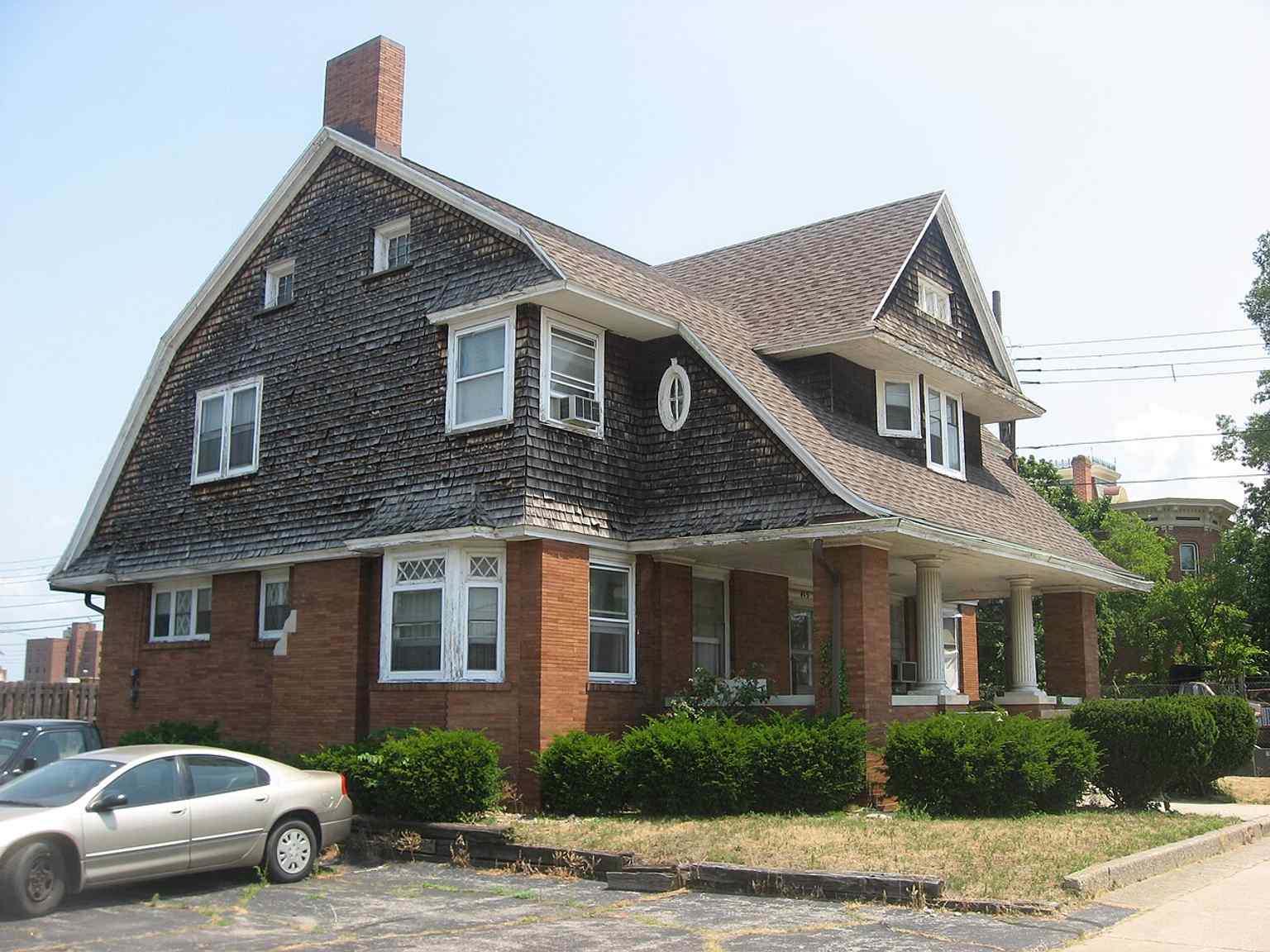 Western and front views of the Hager House, a 1910 Shingle Style home in South Bend that was later listed on the National Register of Historic Places.