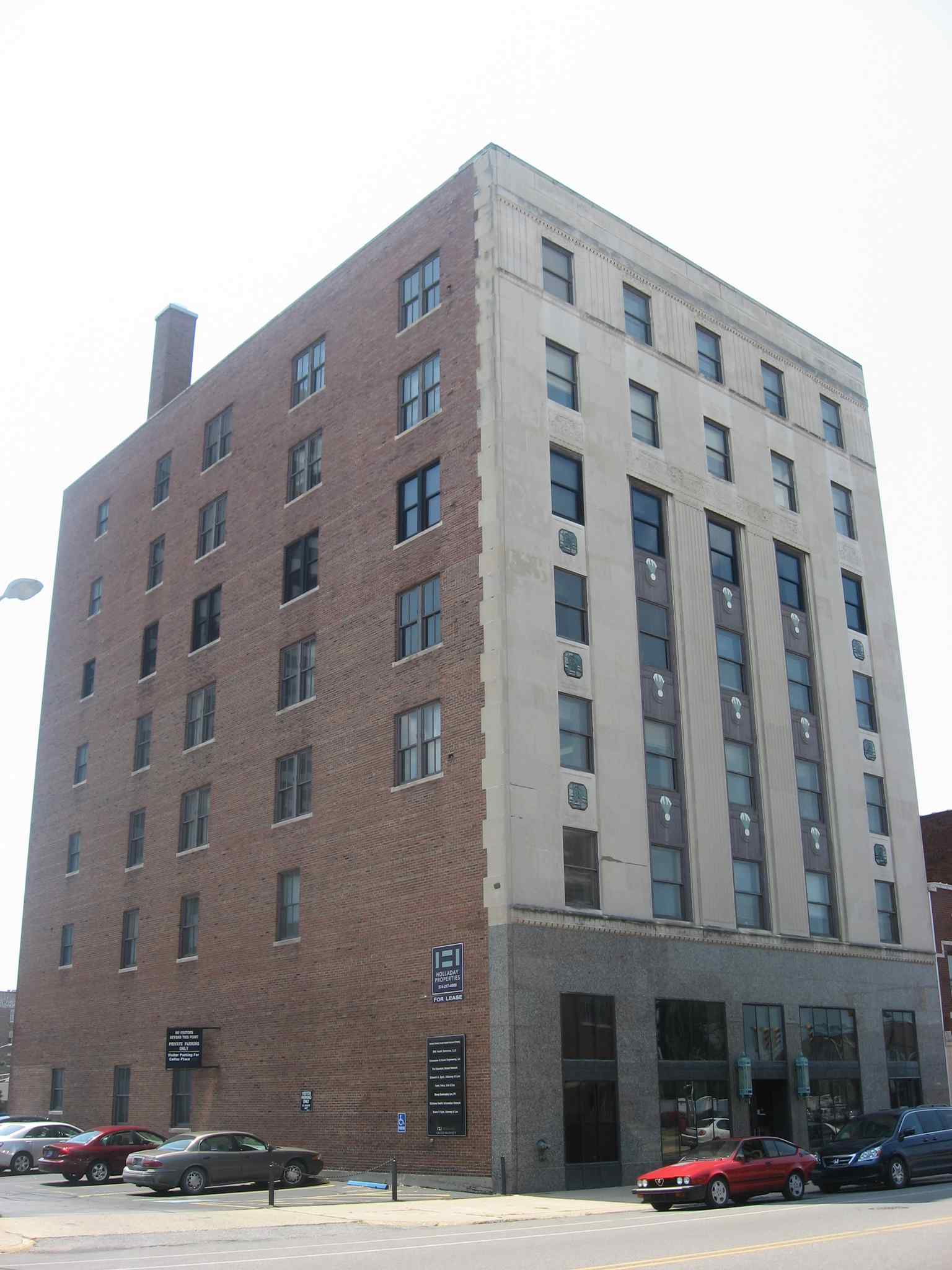 View the I & M Building, an iconic seven-story Art Deco masterpiece built in 1929, featuring its distinctive marble first story, limestone facade, and terra cotta detailing, which makes it the only "pure" example of the style in South Bend's downtown.