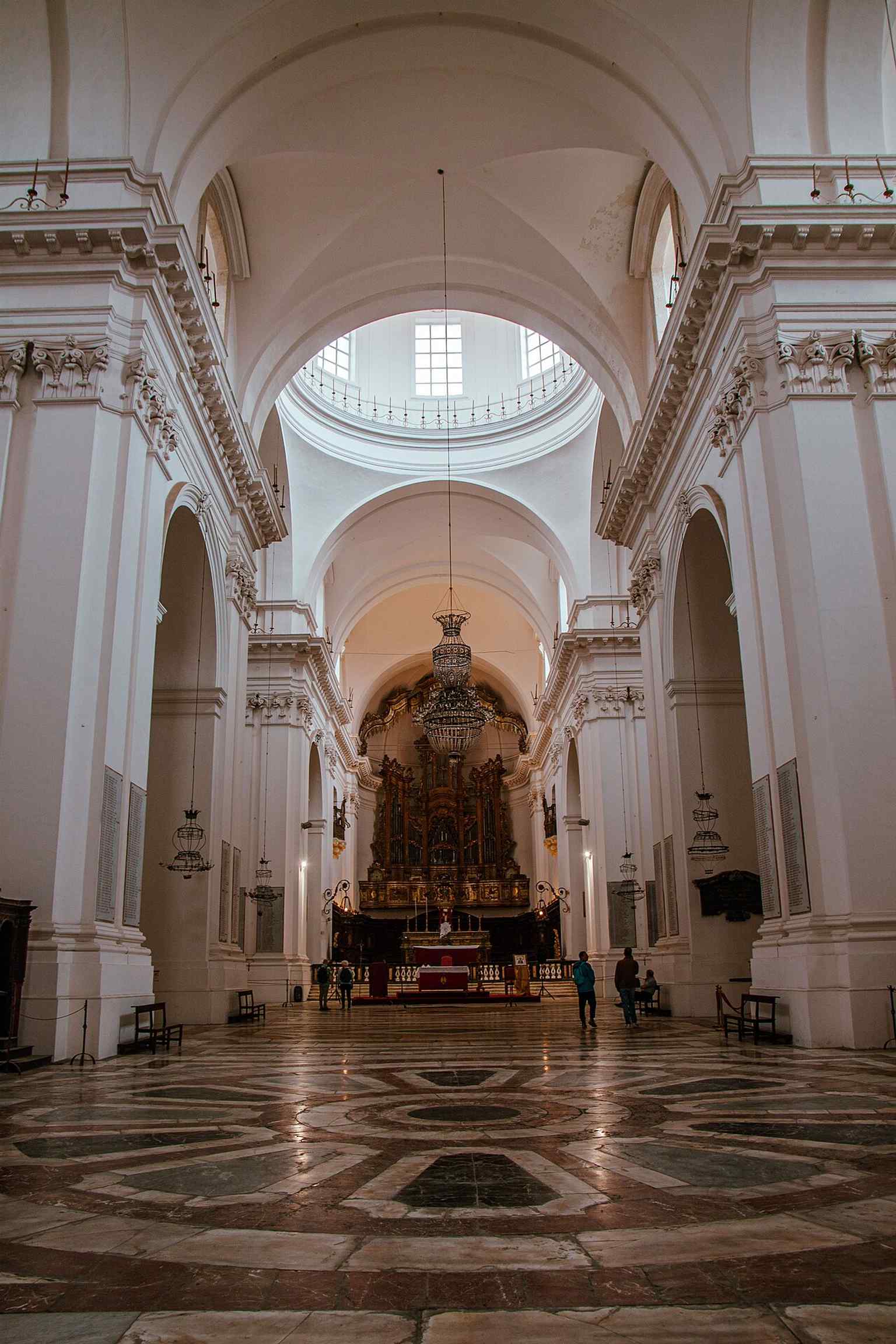 The church’s unfinished Baroque façade on Piazza Dante — its massive columns were never completed after funding disputes and the 1866 confiscation.