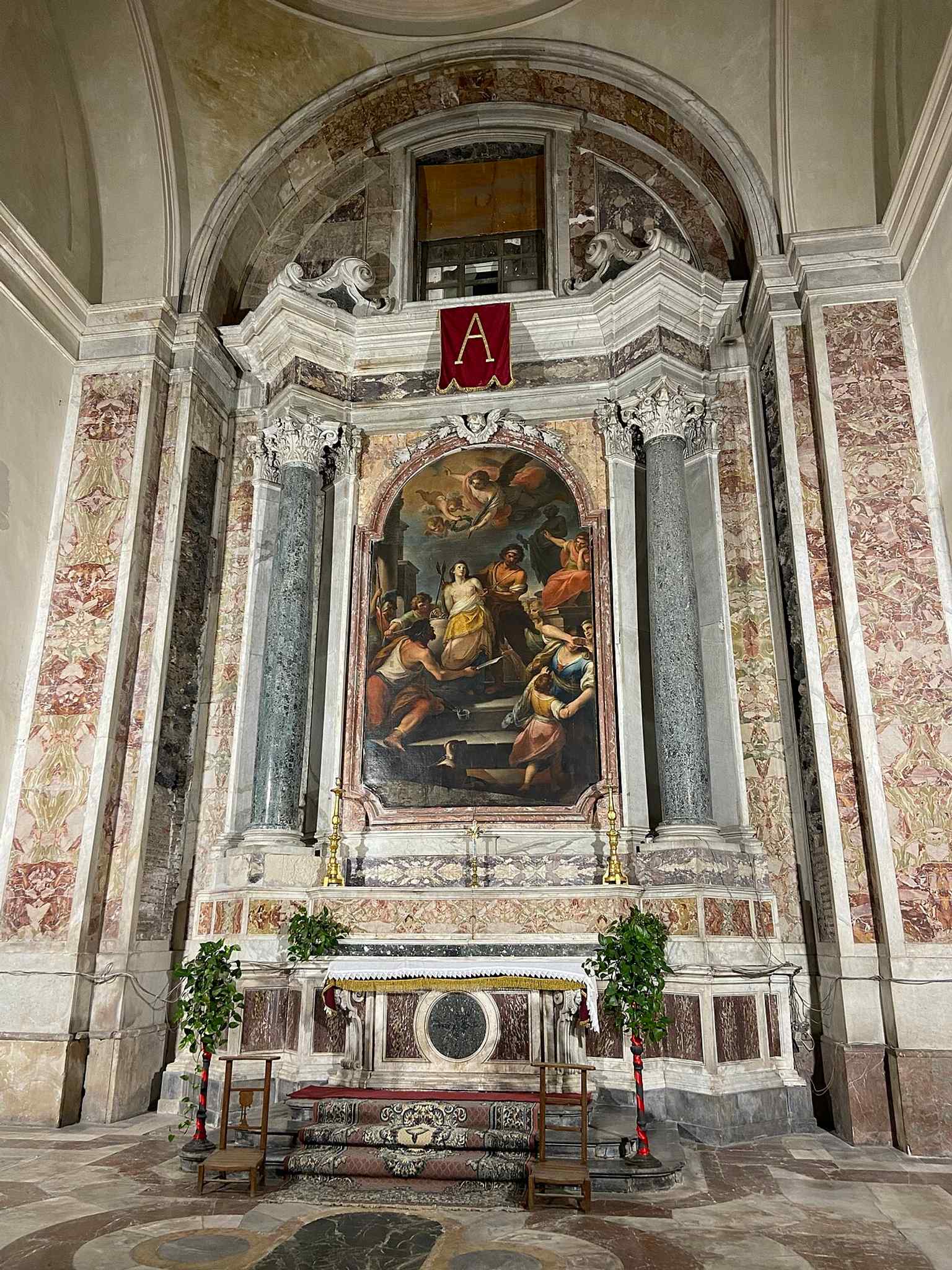 One of the side altars of San Nicolò l’Arena, reflecting the church’s many chapel artworks commissioned by Benedictine patrons.