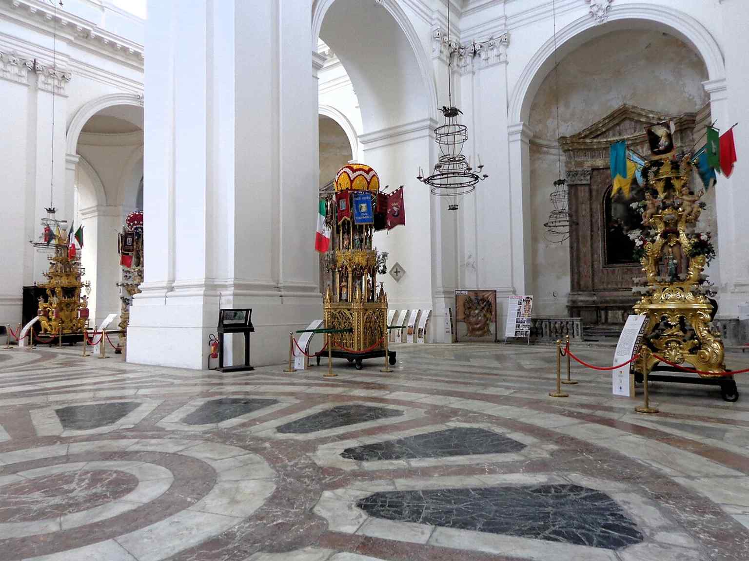 The building from a wider, more architectural angle — good for conveying the scale of the nave and facade together.