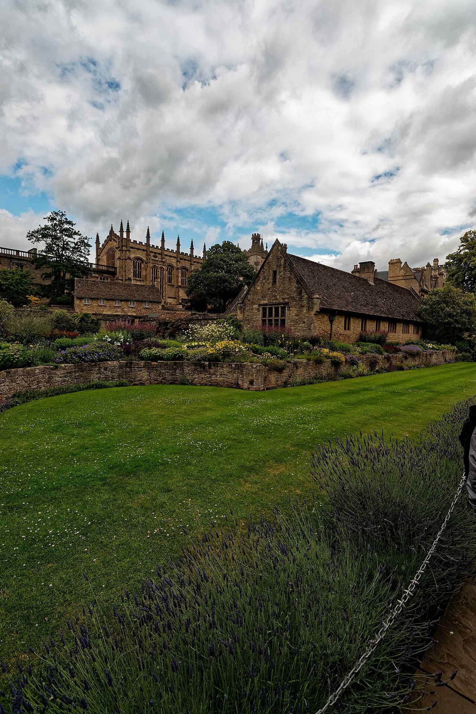 From Broad Walk, Tom Tower stands beyond the Christ Church War Memorial Garden, showing how the tower overlooks the college precinct.